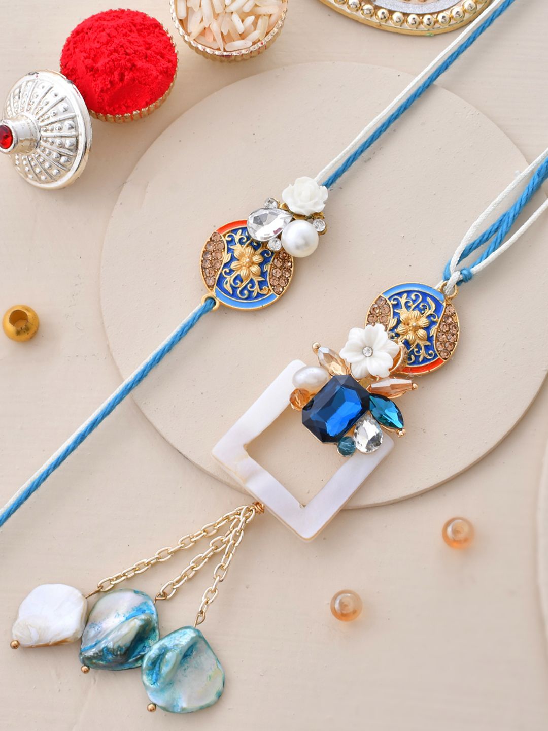 Aapno Rajasthan Stone Studded & Beaded Bhaiya Bhabhi Thread Rakhis with Roli Chawal, Blue
Aapno Rajasthan Stone Studded & Beaded Bhaiya Bhabhi Thread Rakhis with Roli Chawal, Blue