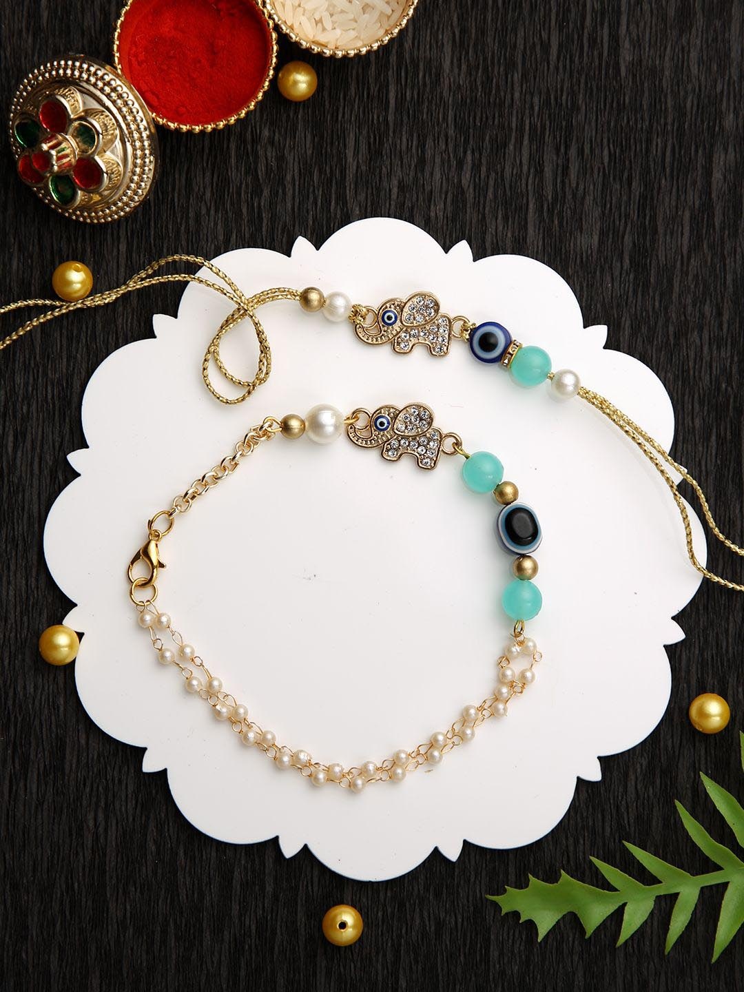 Aapno Rajasthan Stone Studded & Beaded Bhaiya Bhabhi Thread Rakhis with Roli Chawal, Gold
Aapno Rajasthan Stone Studded & Beaded Bhaiya Bhabhi Thread Rakhis with Roli Chawal, Gold