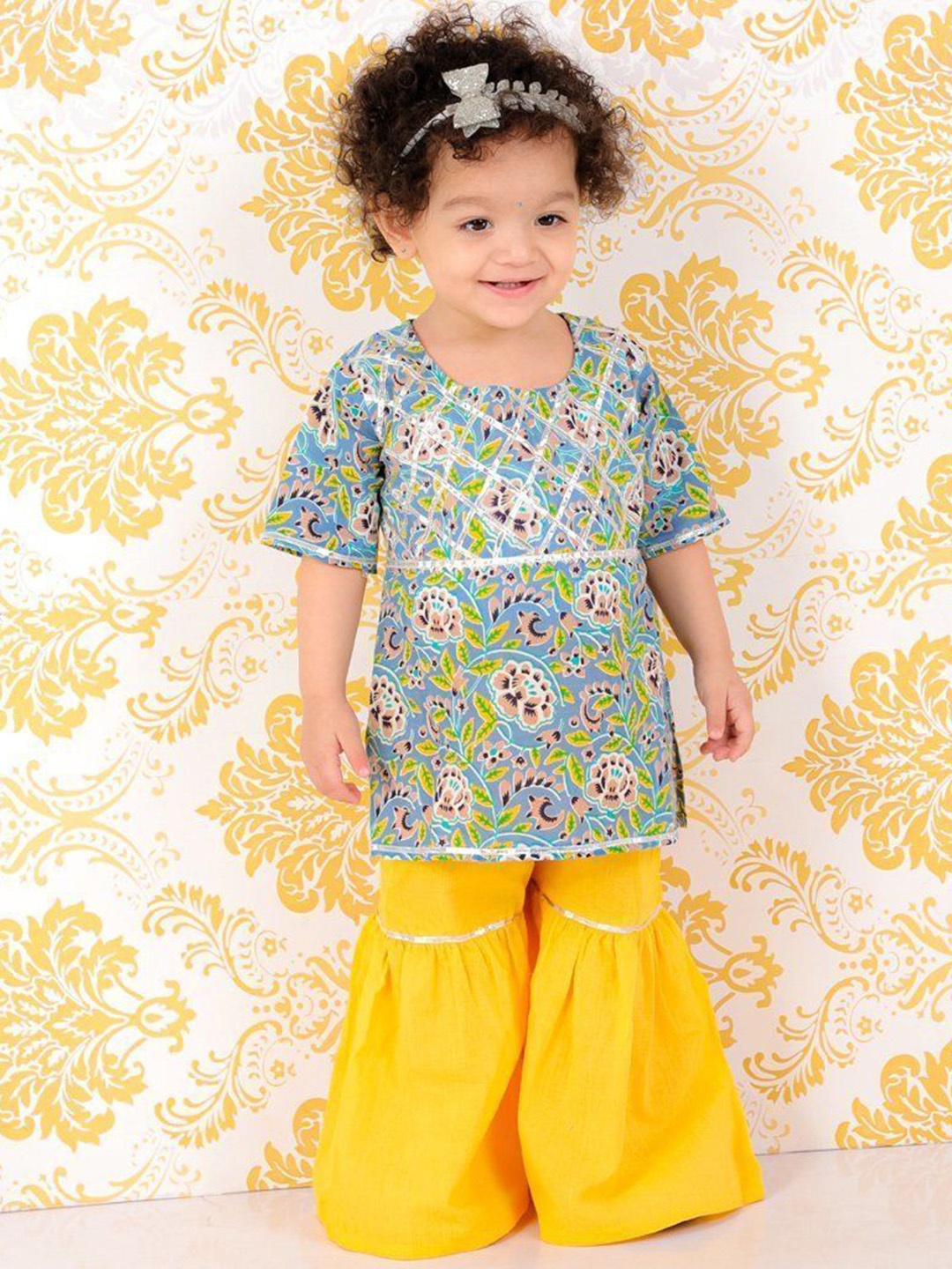 The Mom Store Girls Floral Printed Regular Gotta Patti Pure Cotton Kurti with Sharara, Blue
The Mom Store Girls Floral Printed Regular Gotta Patti Pure Cotton Kurti with Sharara, Blue