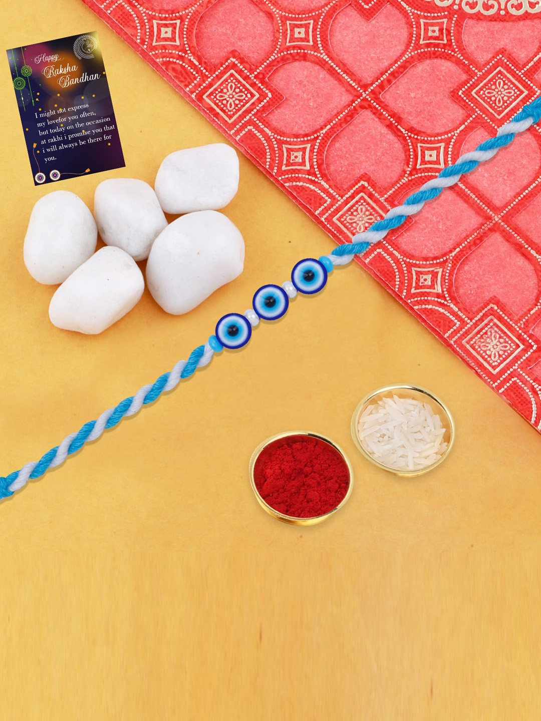 Silver Shine Set Of 3 Evil Eye Beaded Thread Rakhi With Roli Chawal & Pooja Thali, Blue
Silver Shine Set Of 3 Evil Eye Beaded Thread Rakhi With Roli Chawal & Pooja Thali, Blue