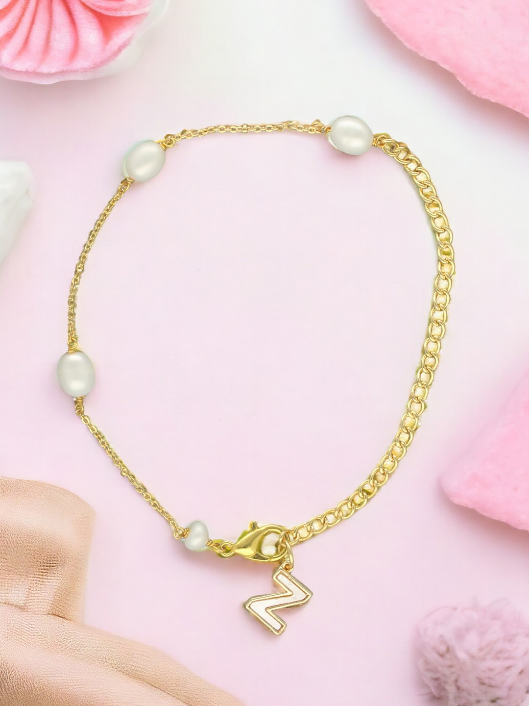 Sri Jagdamba Pearls Dealer Gold-Plated Mother of Pearl Studded Z Alphabet Charm Bracelet
Sri Jagdamba Pearls Dealer Gold-Plated Mother of Pearl Studded Z Alphabet Charm Bracelet