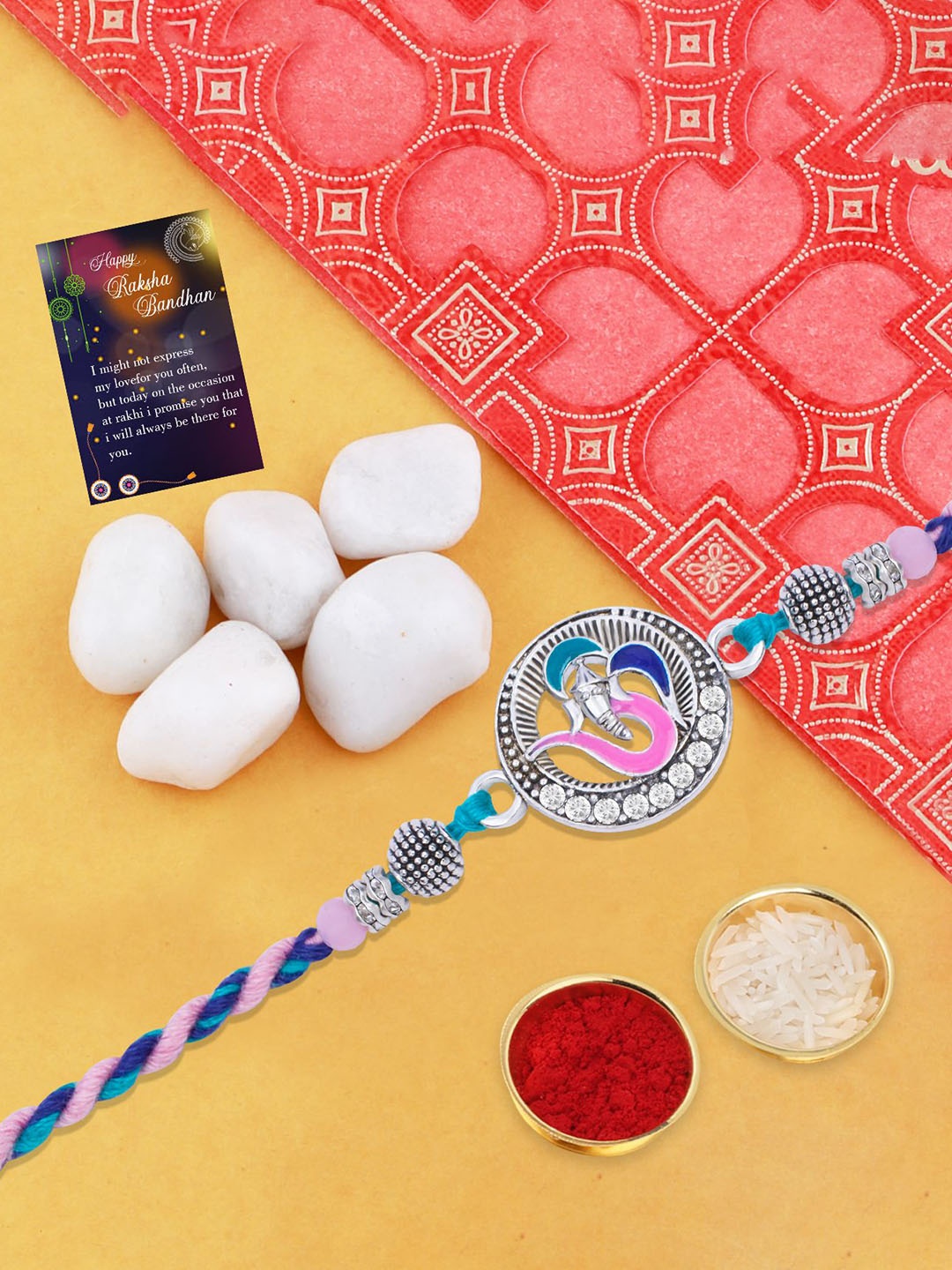 Silver Shine Set of 2 Beaded Om Charm Rakhi With Roli Chawal & Kankawati Pooja Thali, Blue
Silver Shine Set of 2 Beaded Om Charm Rakhi With Roli Chawal & Kankawati Pooja Thali, Blue