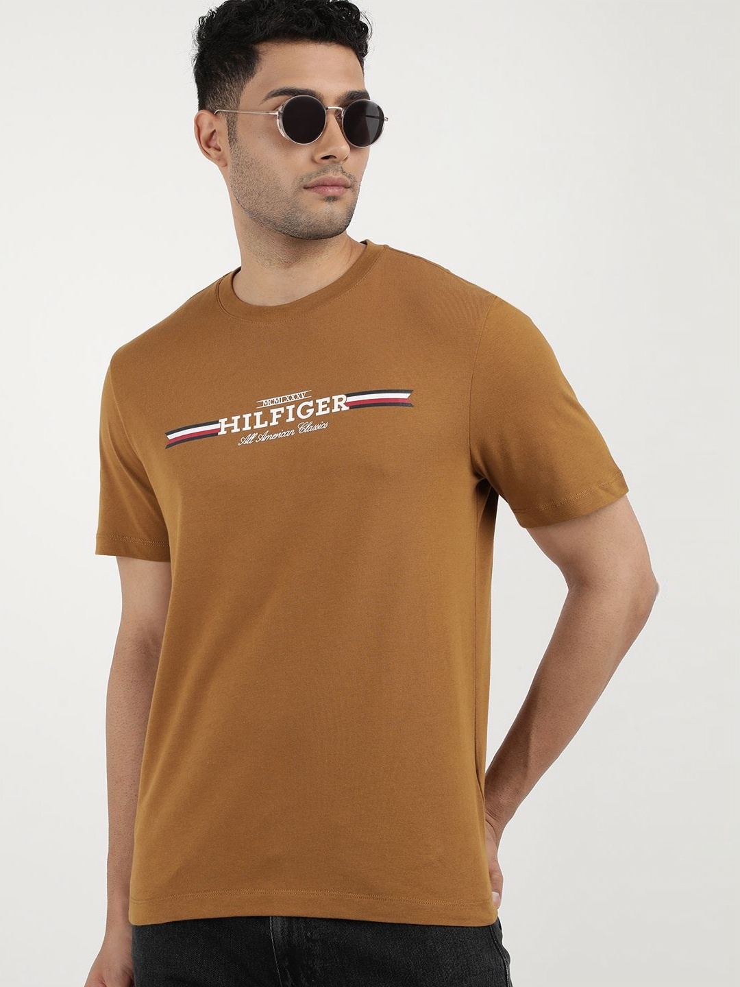Tommy Hilfiger Round Neck Short Sleeves Typography Printed Casual T-shirt, Brown
Tommy Hilfiger Round Neck Short Sleeves Typography Printed Casual T-shirt, Brown