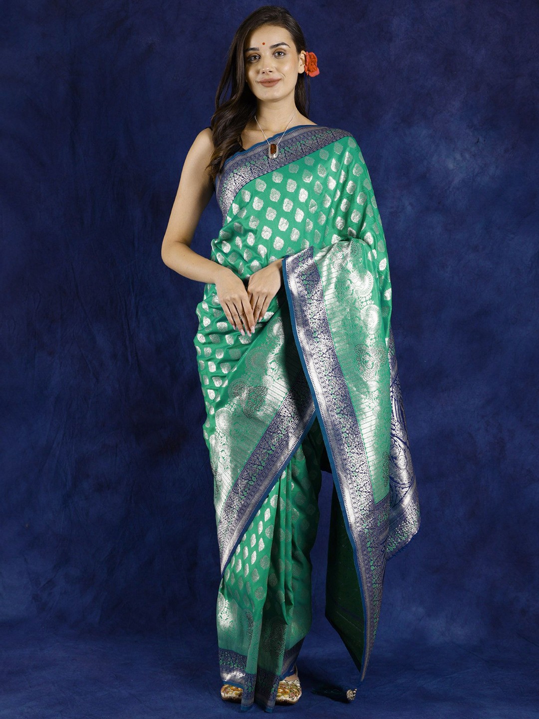 Exotic India Dynasty Green Art Silk Saree with Zari Woven Bootis Peacocks and Beadwork
Exotic India Dynasty Green Art Silk Saree with Zari Woven Bootis Peacocks and Beadwork