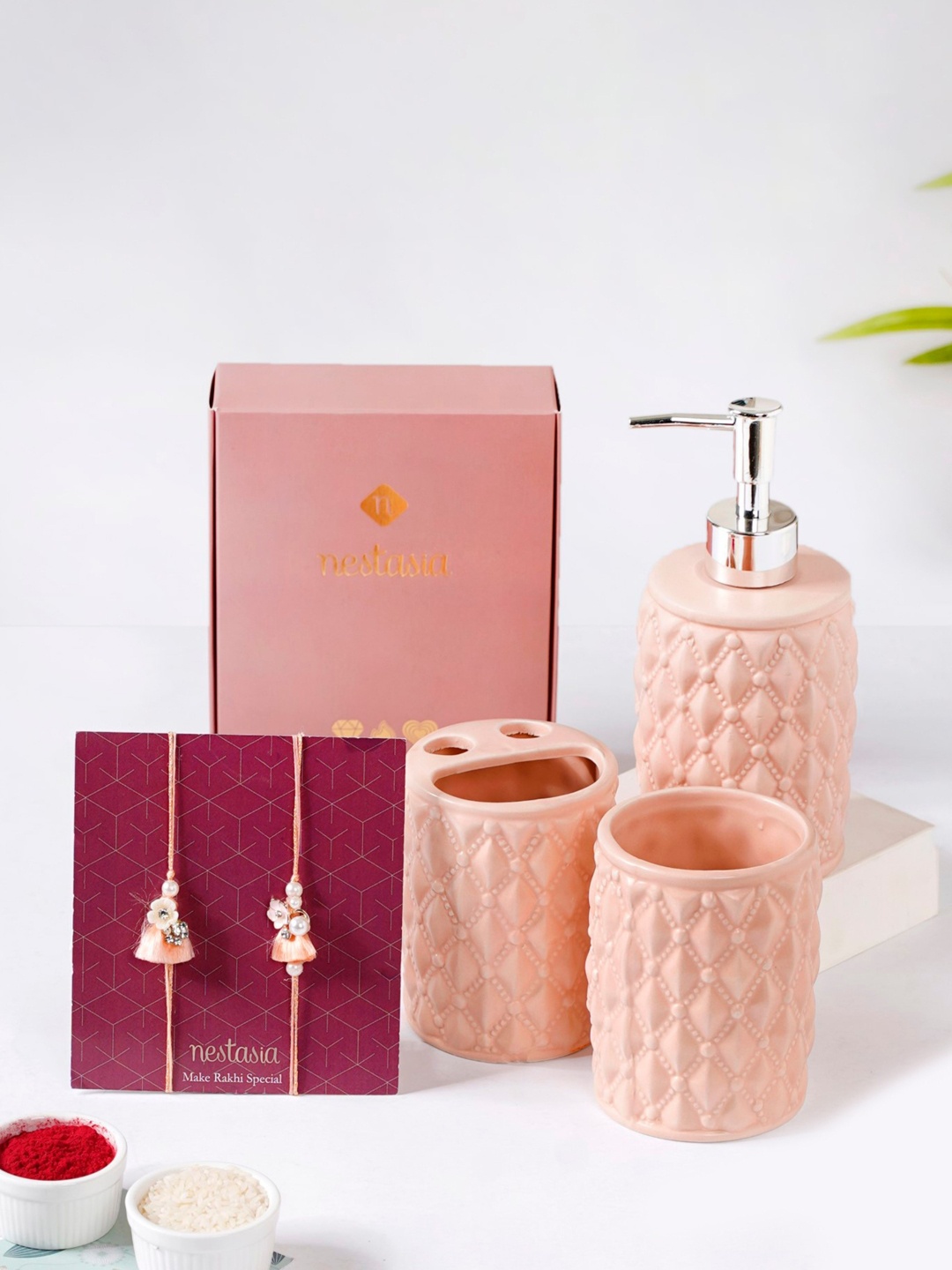 Nestasia Set Of 2 Stone-Studded Rakhis With Bath Set Roli Chawal & Greeting Card, Peach
Nestasia Set Of 2 Stone-Studded Rakhis With Bath Set Roli Chawal & Greeting Card, Peach