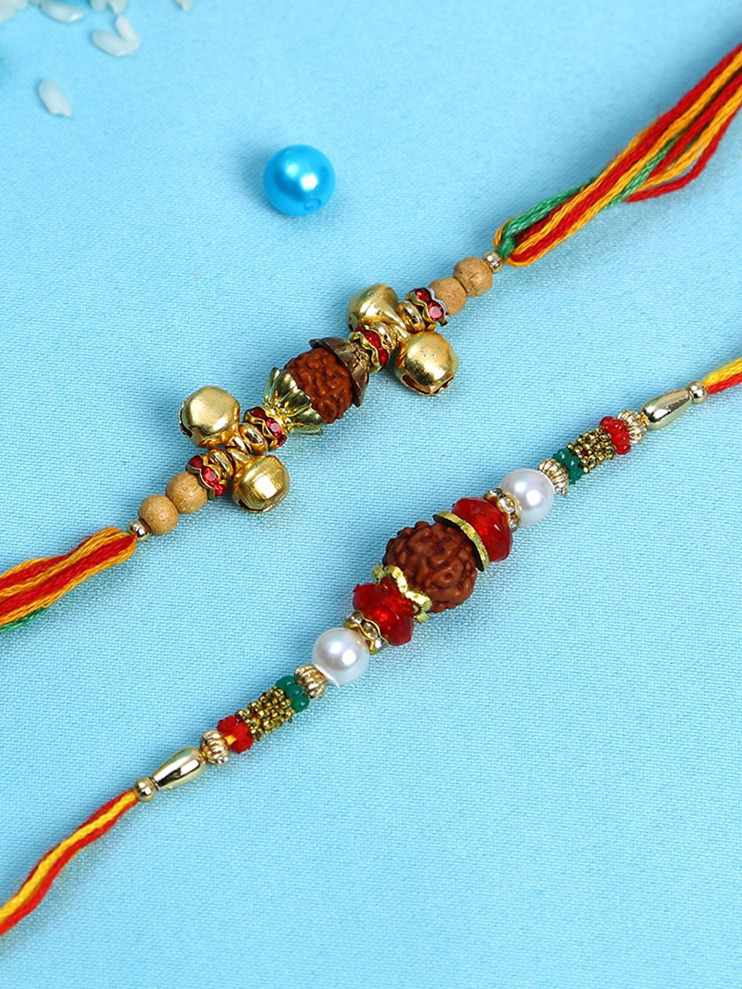 Anouk Set Of 2 Small Bells & Rudaraksh Rakhi Comes With Roli Rice & Greeting Card, Gold
Anouk Set Of 2 Small Bells & Rudaraksh Rakhi Comes With Roli Rice & Greeting Card, Gold