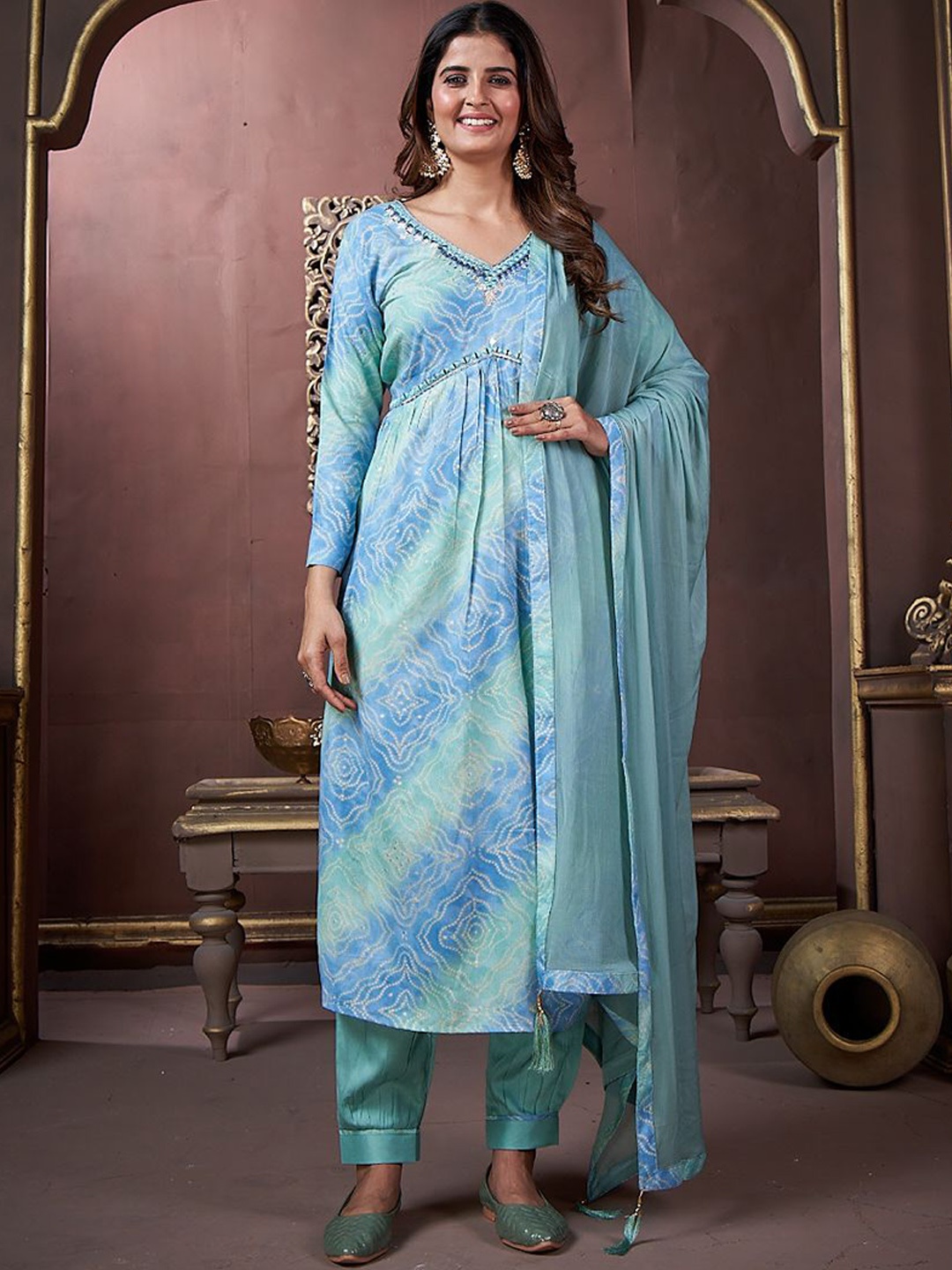 Rujave Bandhani Printed Regular Mirror Work Kurta with Trousers & Dupatta, Turquoise blue
Rujave Bandhani Printed Regular Mirror Work Kurta with Trousers & Dupatta, Turquoise blue