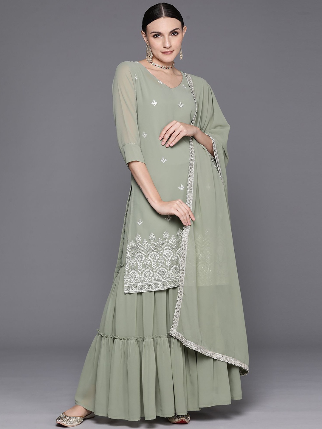 Indo Era Ethnic Motifs Embroidered V-Neck Thread Work Kurta With Sharara & Dupatta, Sea green
Indo Era Ethnic Motifs Embroidered V-Neck Thread Work Kurta With Sharara & Dupatta, Sea green