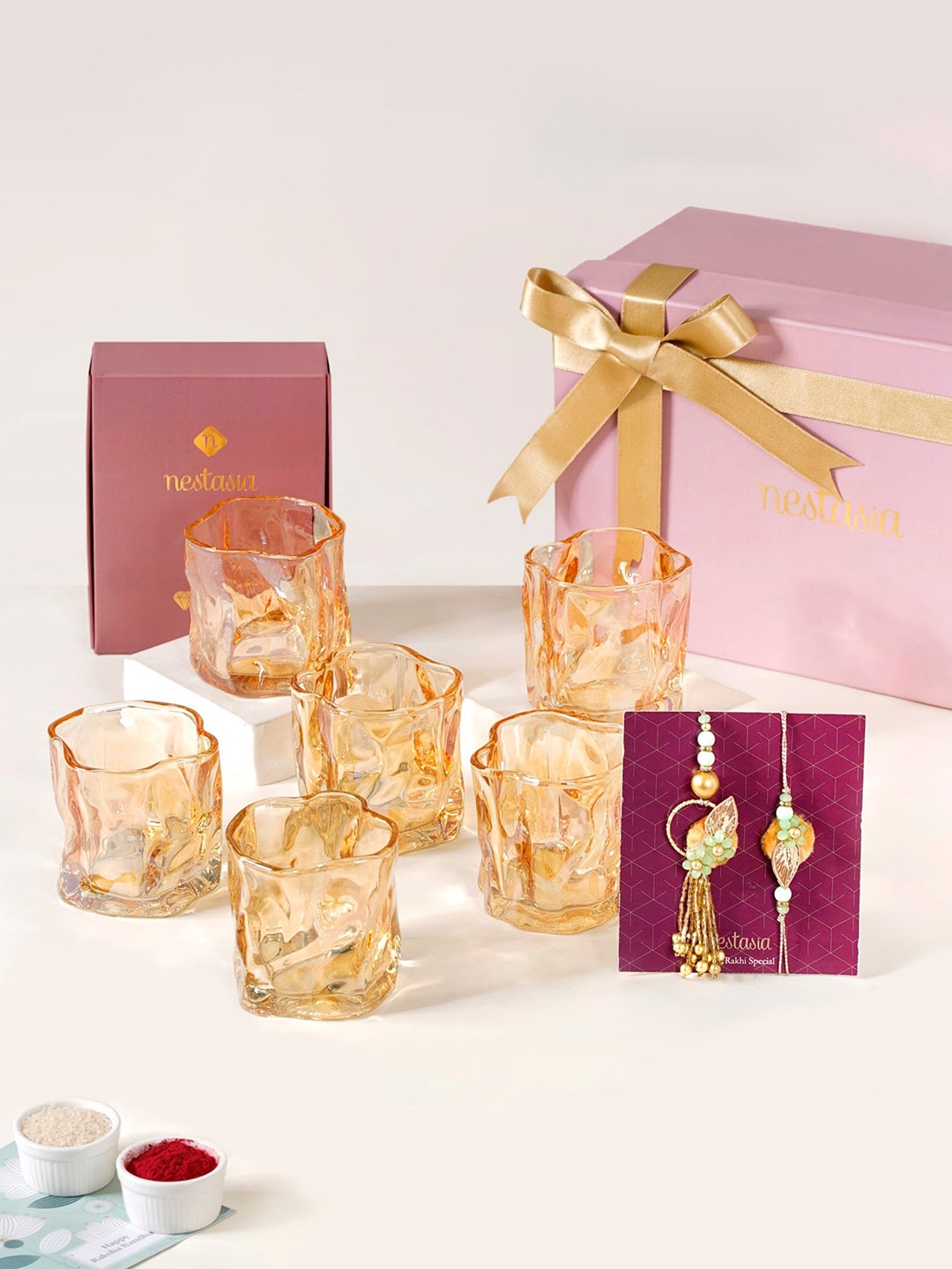 Nestasia Set Of 8 Bhaiya Bhabhi Rakhi With Shot Glass Roli Chawal & Greeting Card, Gold
Nestasia Set Of 8 Bhaiya Bhabhi Rakhi With Shot Glass Roli Chawal & Greeting Card, Gold
