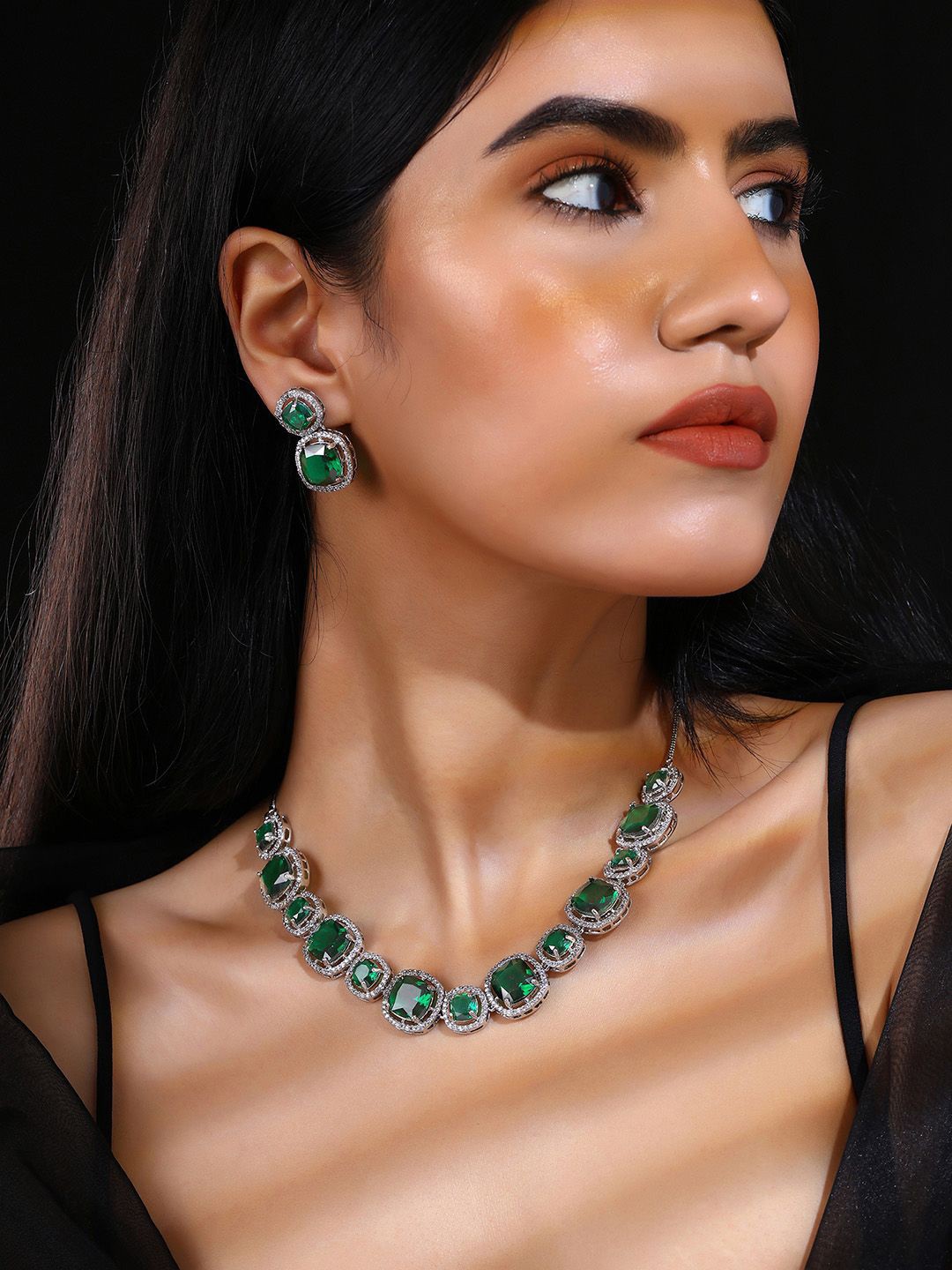 Priyaasi Silver-Plated Emerald Geometrical Pattern American Diamond-Studded Jewellery Set
Priyaasi Silver-Plated Emerald Geometrical Pattern American Diamond-Studded Jewellery Set