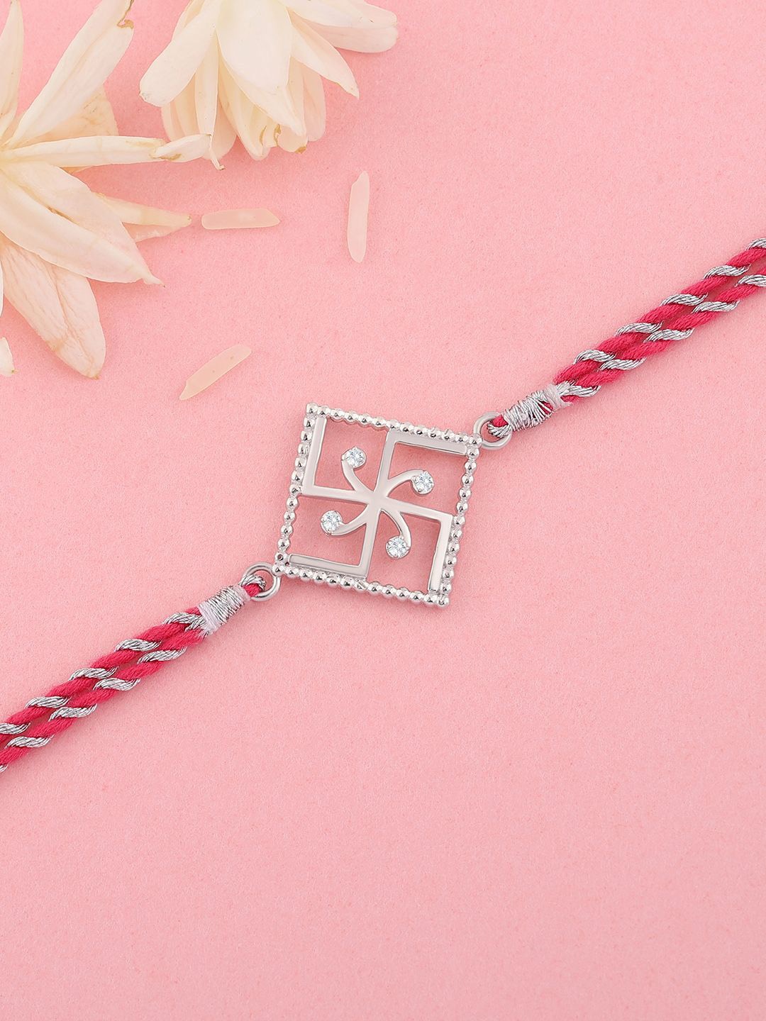 Ornate Jewels 925 Silver Swastik Charm Thread Rakhi With Roli Chawal & Greeting Card
Ornate Jewels 925 Silver Swastik Charm Thread Rakhi With Roli Chawal & Greeting Card