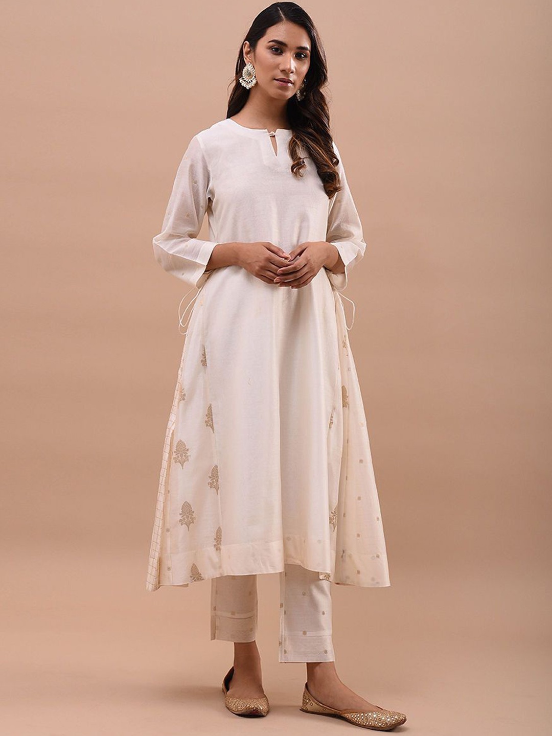 SMRITI GUPTA Ethnic Motifs Printed Keyhole Neck Thread Work Chanderi Silk A-Line Kurta, Off white
SMRITI GUPTA Ethnic Motifs Printed Keyhole Neck Thread Work Chanderi Silk A-Line Kurta, Off white