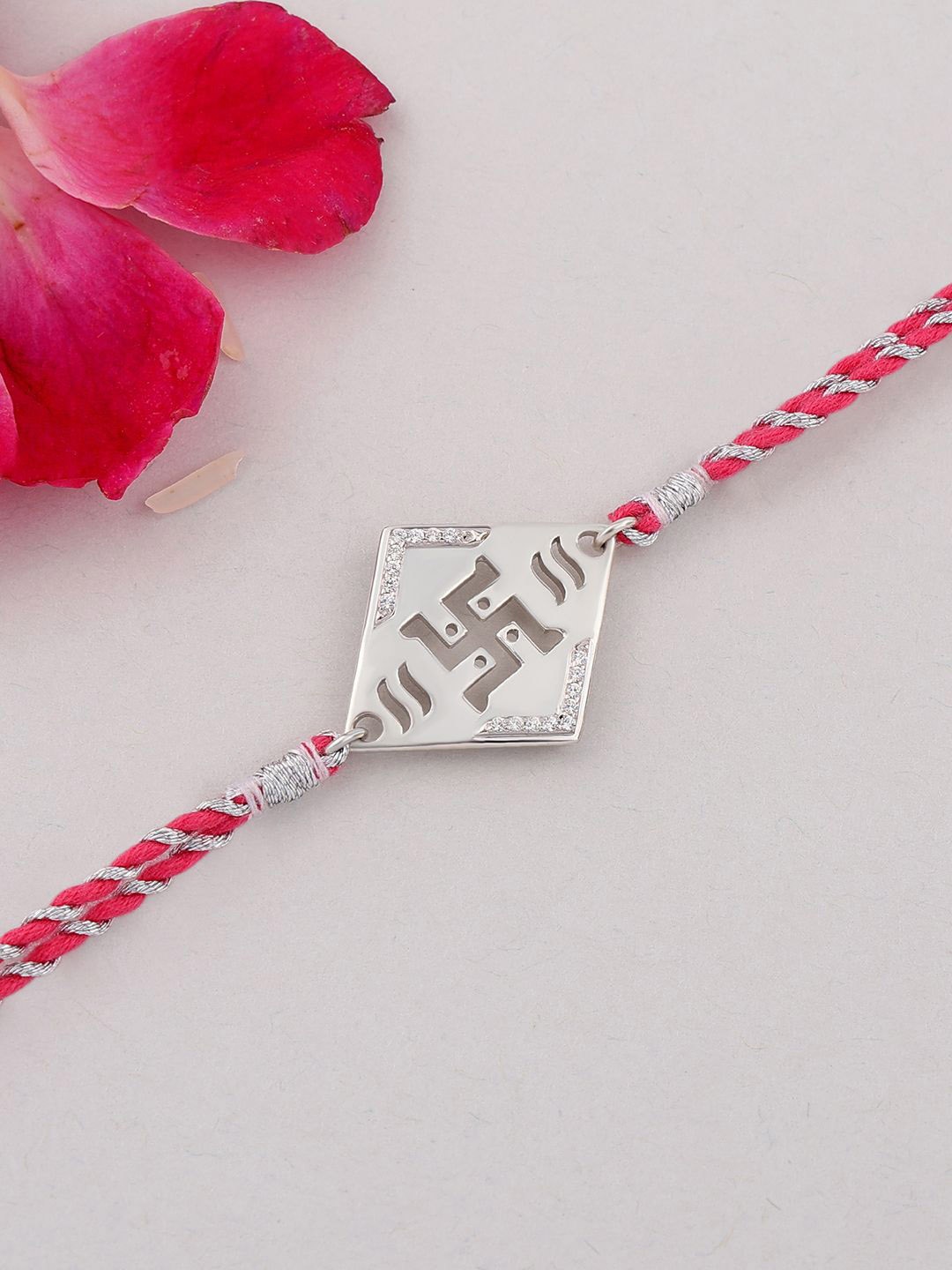 Ornate Jewels 925 Silver American Diamond Swastik Thread Rakhi With Roli Chawal
Ornate Jewels 925 Silver American Diamond Swastik Thread Rakhi With Roli Chawal