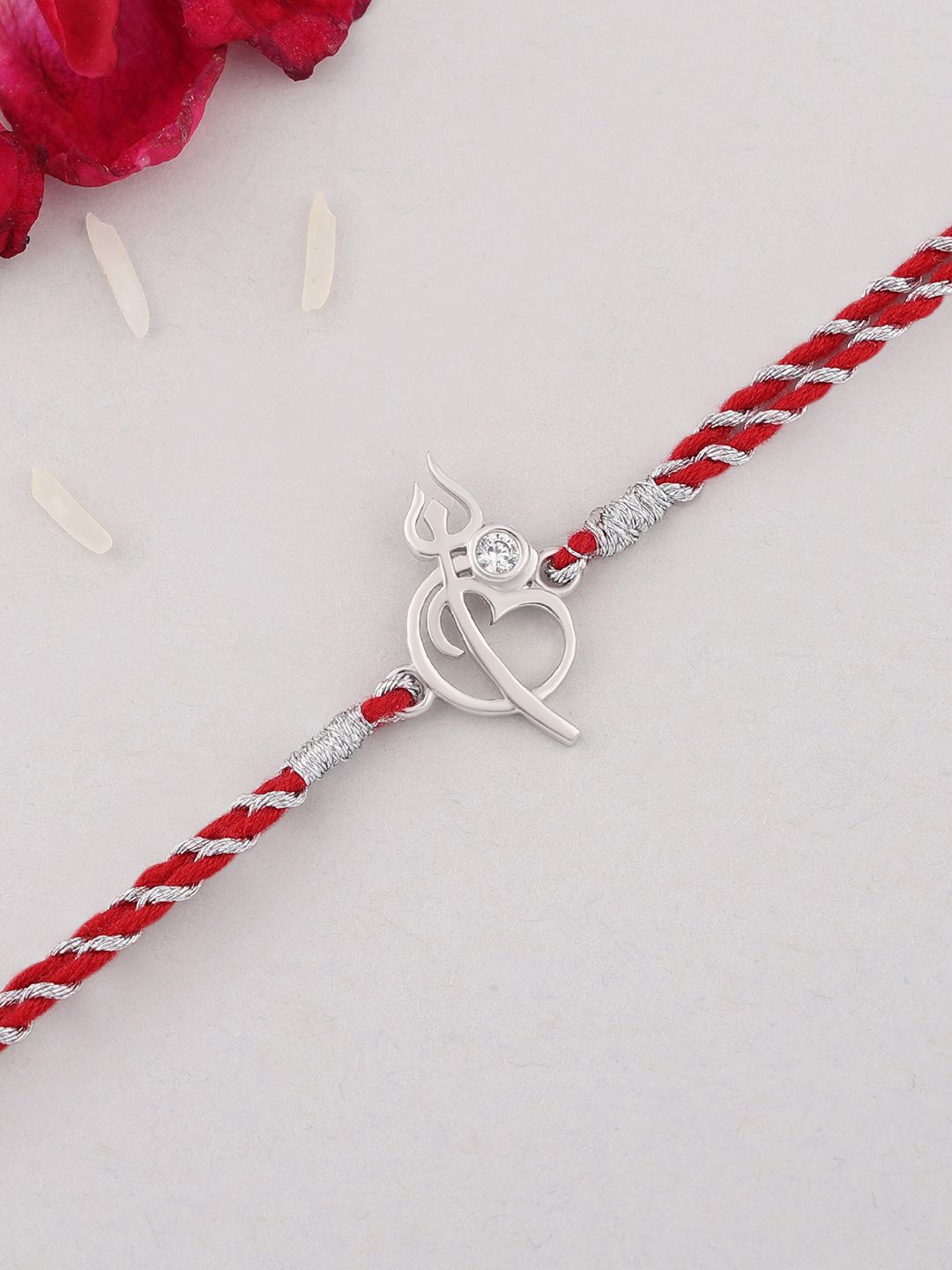 Ornate Jewels 925 Silver American Diamond Divine Trishul Thread Rakhi With Roli Chawal
Ornate Jewels 925 Silver American Diamond Divine Trishul Thread Rakhi With Roli Chawal