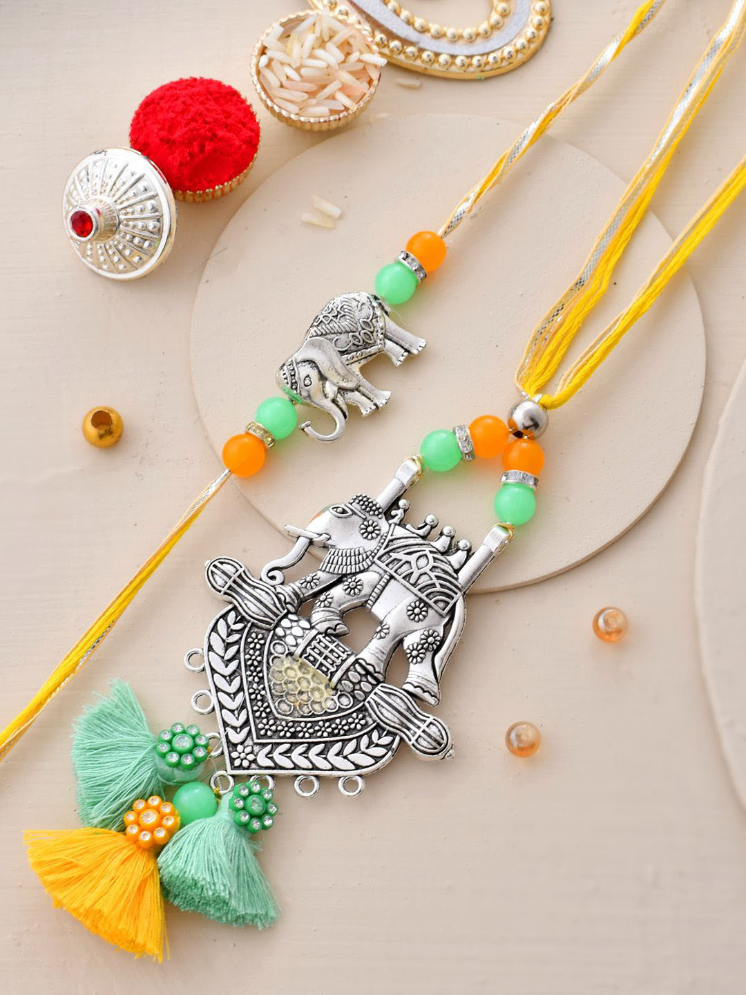 Sangria Oxidised Elephant Resham Bhaiya Bhabhi Rakhi With Roli Chawal & Greeting Card, Silver
Sangria Oxidised Elephant Resham Bhaiya Bhabhi Rakhi With Roli Chawal & Greeting Card, Silver