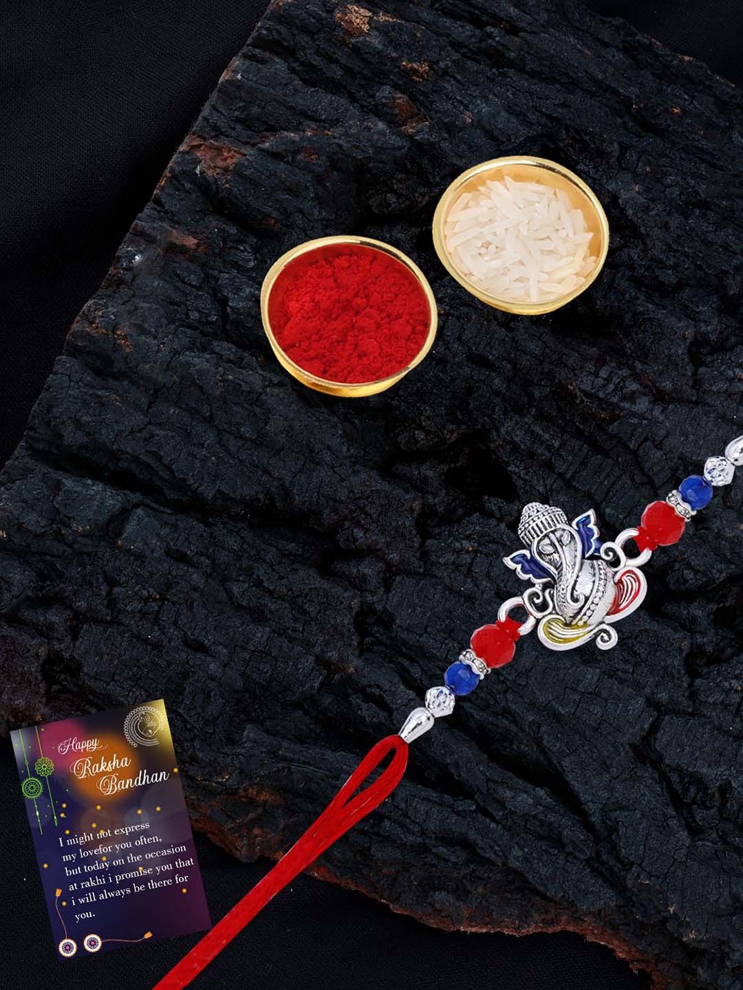 Silver Shine Set Of 2 Beaded and Ganesha Thread Rakhis with Greeting Card & Roli Chawal, Gold
Silver Shine Set Of 2 Beaded and Ganesha Thread Rakhis with Greeting Card & Roli Chawal, Gold