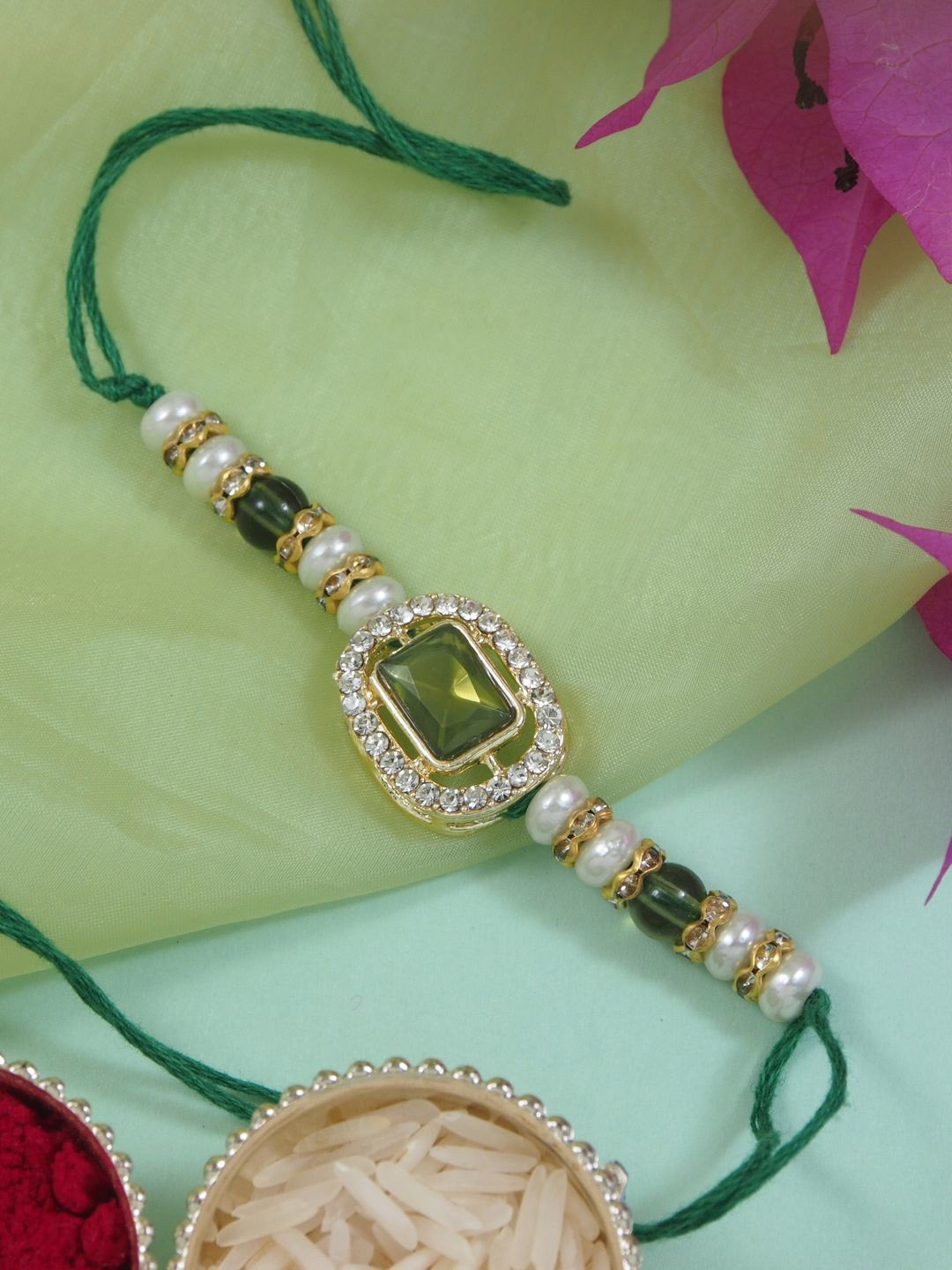 I Jewels Kundan Studded Pearl Beaded Thread Rakhi With Roli Chawal & Rakshabandhan Card, Gold
I Jewels Kundan Studded Pearl Beaded Thread Rakhi With Roli Chawal & Rakshabandhan Card, Gold
