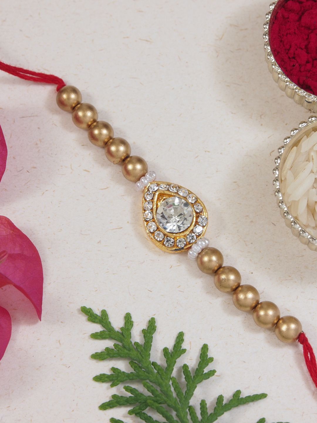 I Jewels Kundan Studded Pearl Beaded Bhaiya Rakhi With Roli Chawal & Rakshabandhan Card, White
I Jewels Kundan Studded Pearl Beaded Bhaiya Rakhi With Roli Chawal & Rakshabandhan Card, White