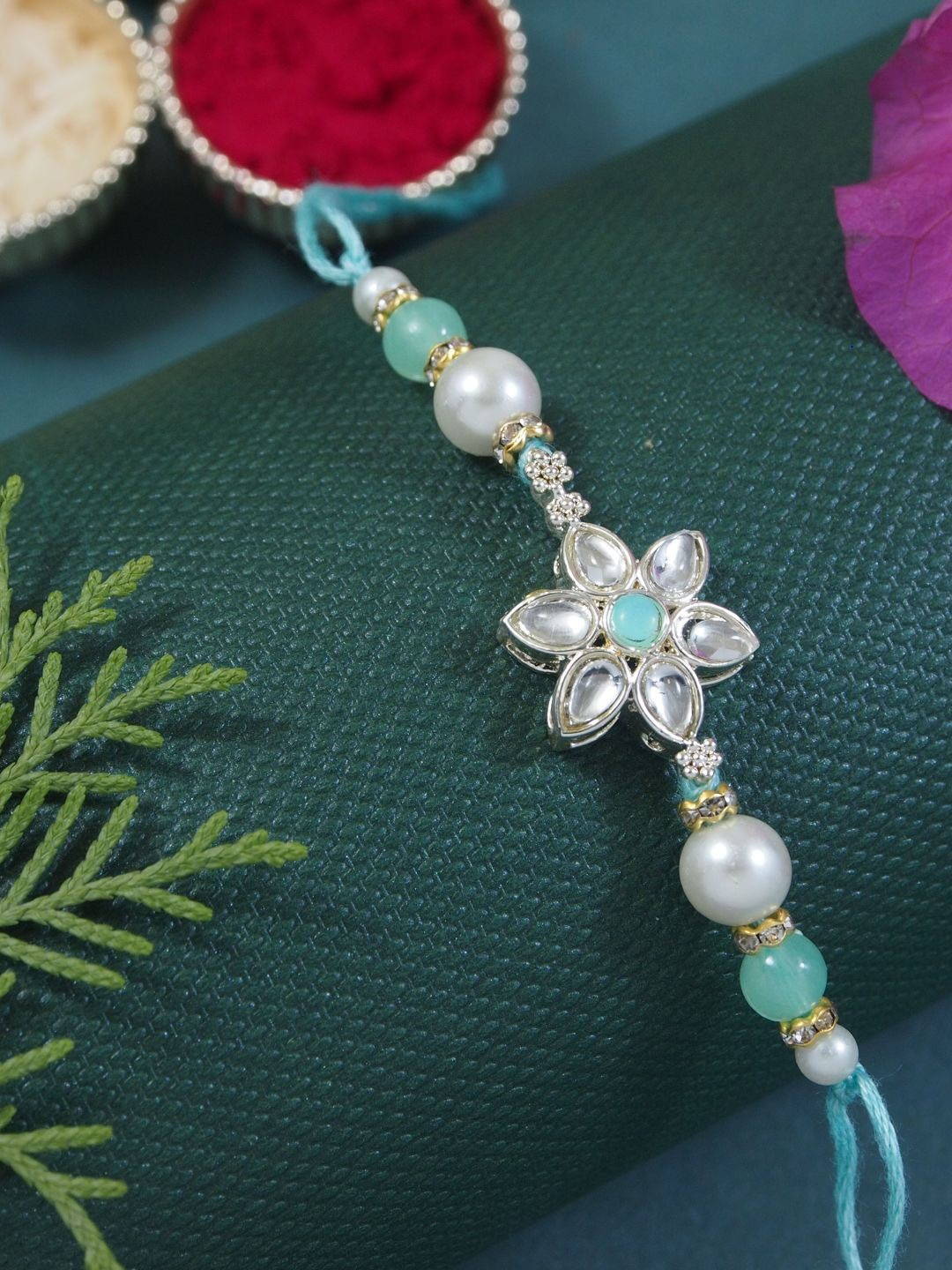 I Jewels Kundan Studded Pearl Beaded Thread Rakhi With Roli Chawal & Rakshabandhan Card, Sea green
I Jewels Kundan Studded Pearl Beaded Thread Rakhi With Roli Chawal & Rakshabandhan Card, Sea green