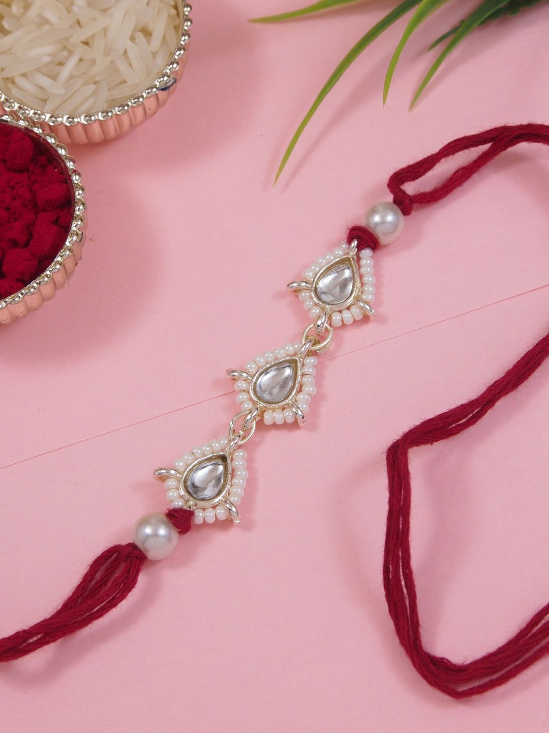 I Jewels Kundan Studded Pearl Beaded Thread Rakhi With Roli Chawal & Rakshabandhan Card, Maroon
I Jewels Kundan Studded Pearl Beaded Thread Rakhi With Roli Chawal & Rakshabandhan Card, Maroon