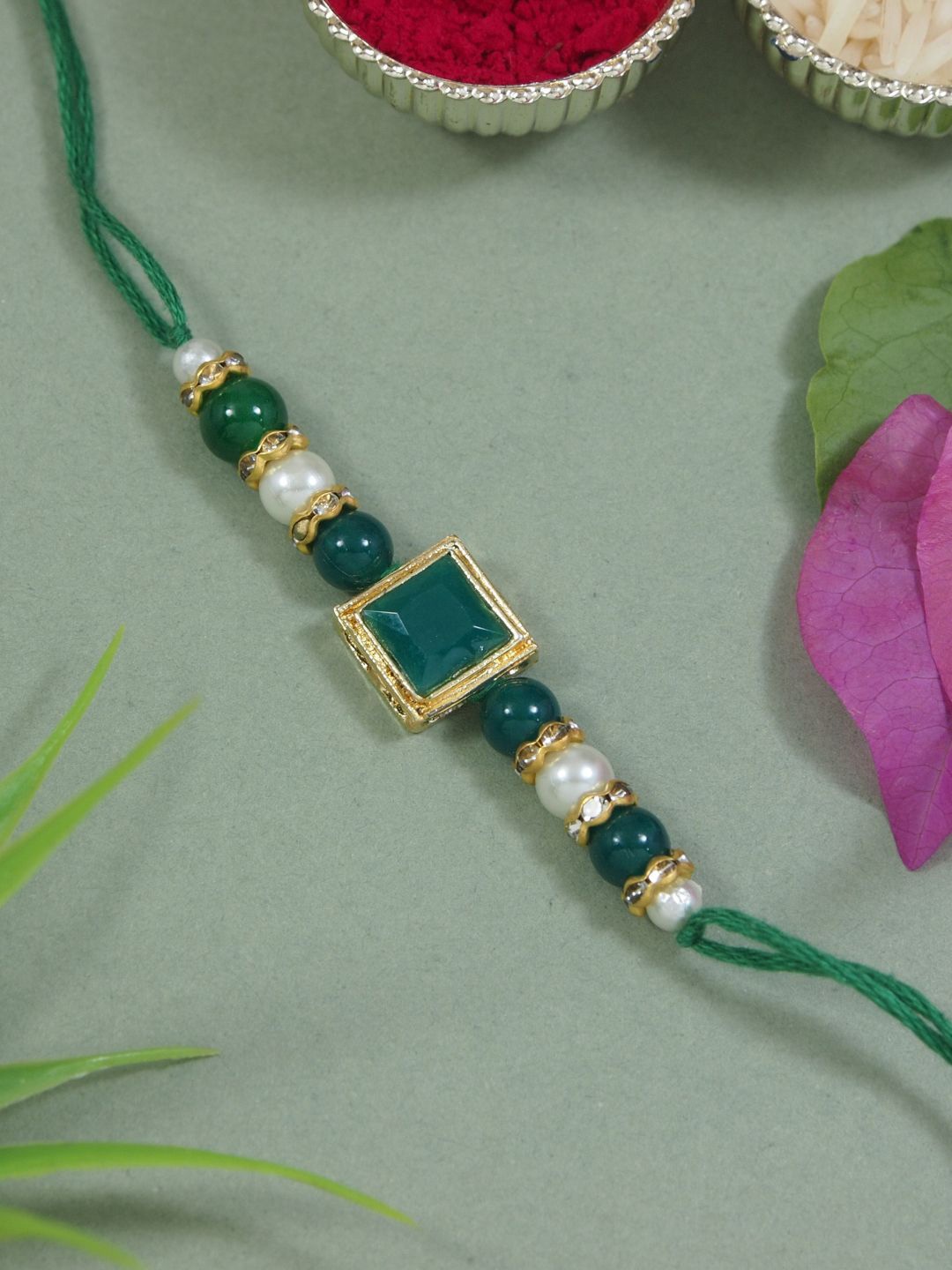 I Jewels Kundan Studded Pearl Beaded Thread Rakhi With Roli Chawal & Rakshabandhan Card, Green
I Jewels Kundan Studded Pearl Beaded Thread Rakhi With Roli Chawal & Rakshabandhan Card, Green