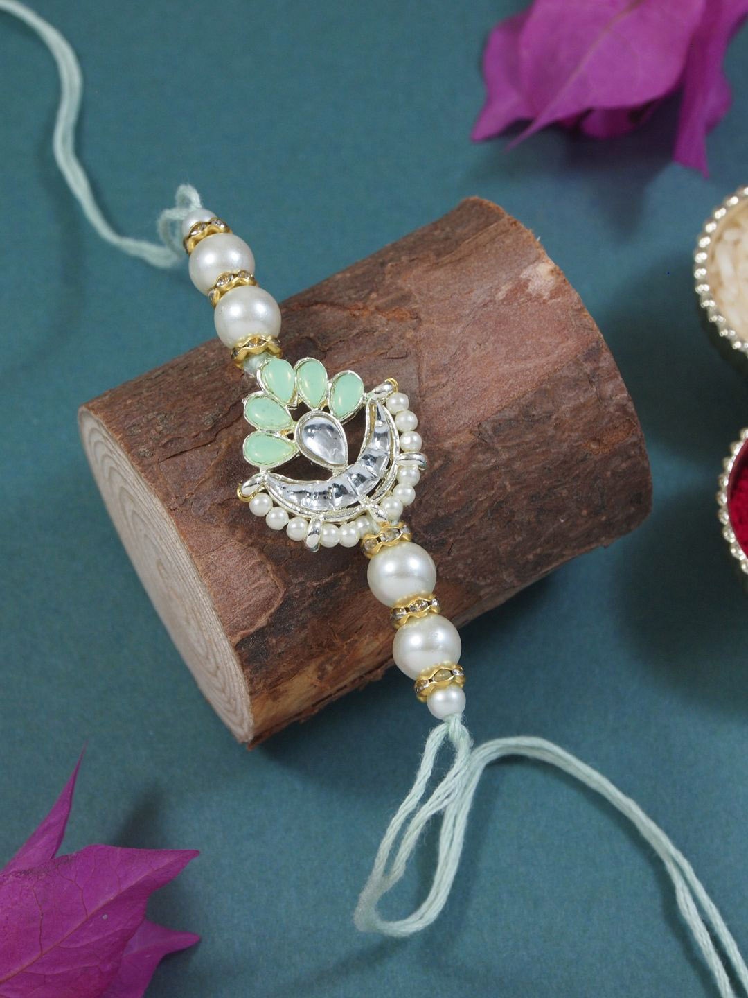 I Jewels Kundan Studded Pearl Beaded Thread Rakhi With Roli Chawal & Rakshabandhan Card, Sea green
I Jewels Kundan Studded Pearl Beaded Thread Rakhi With Roli Chawal & Rakshabandhan Card, Sea green
