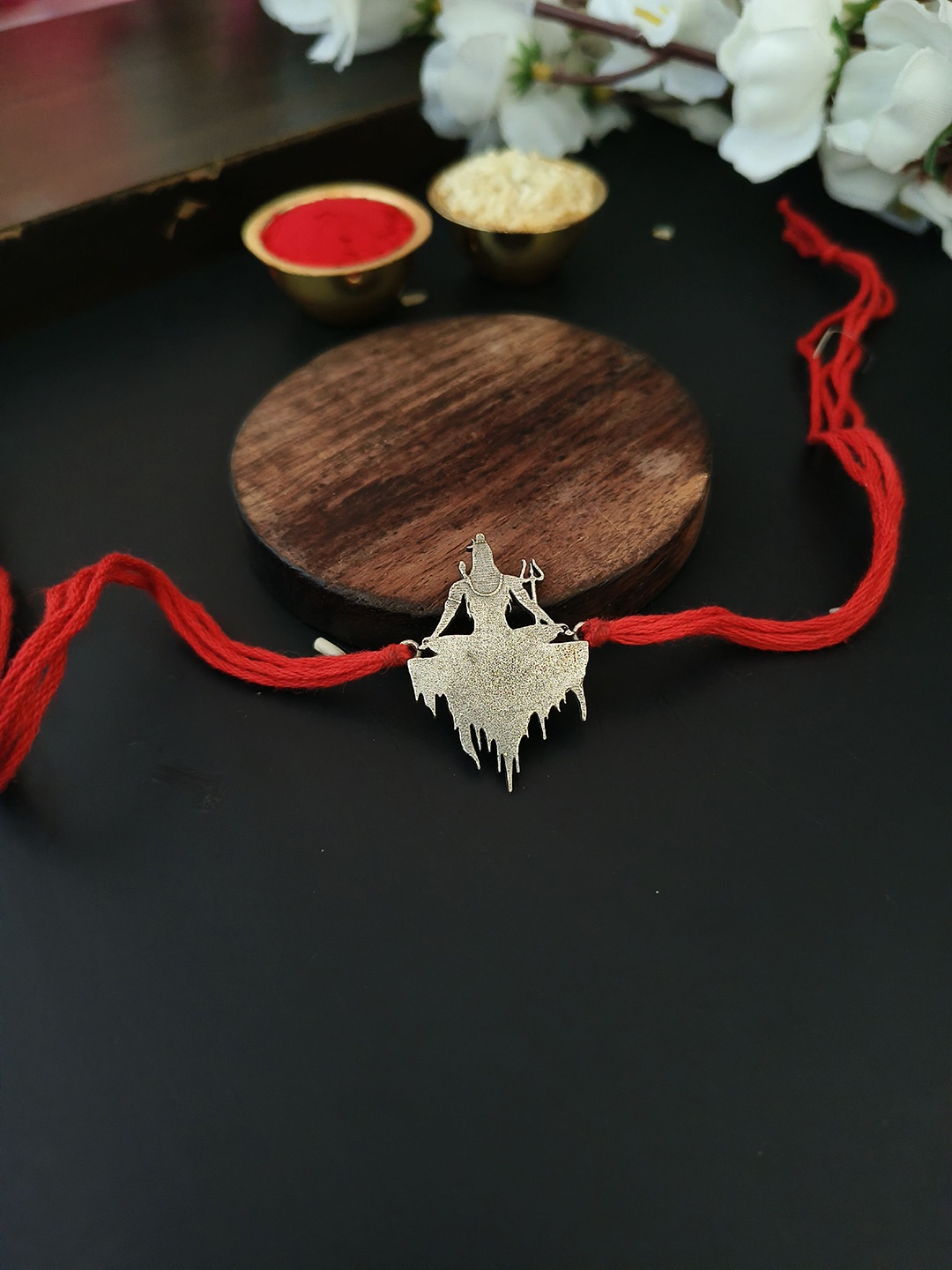 Sangria Silver Plated Jai Shiva Charm Thread Rakhi With Roli Chawal & Greeting Card, Red
Sangria Silver Plated Jai Shiva Charm Thread Rakhi With Roli Chawal & Greeting Card, Red