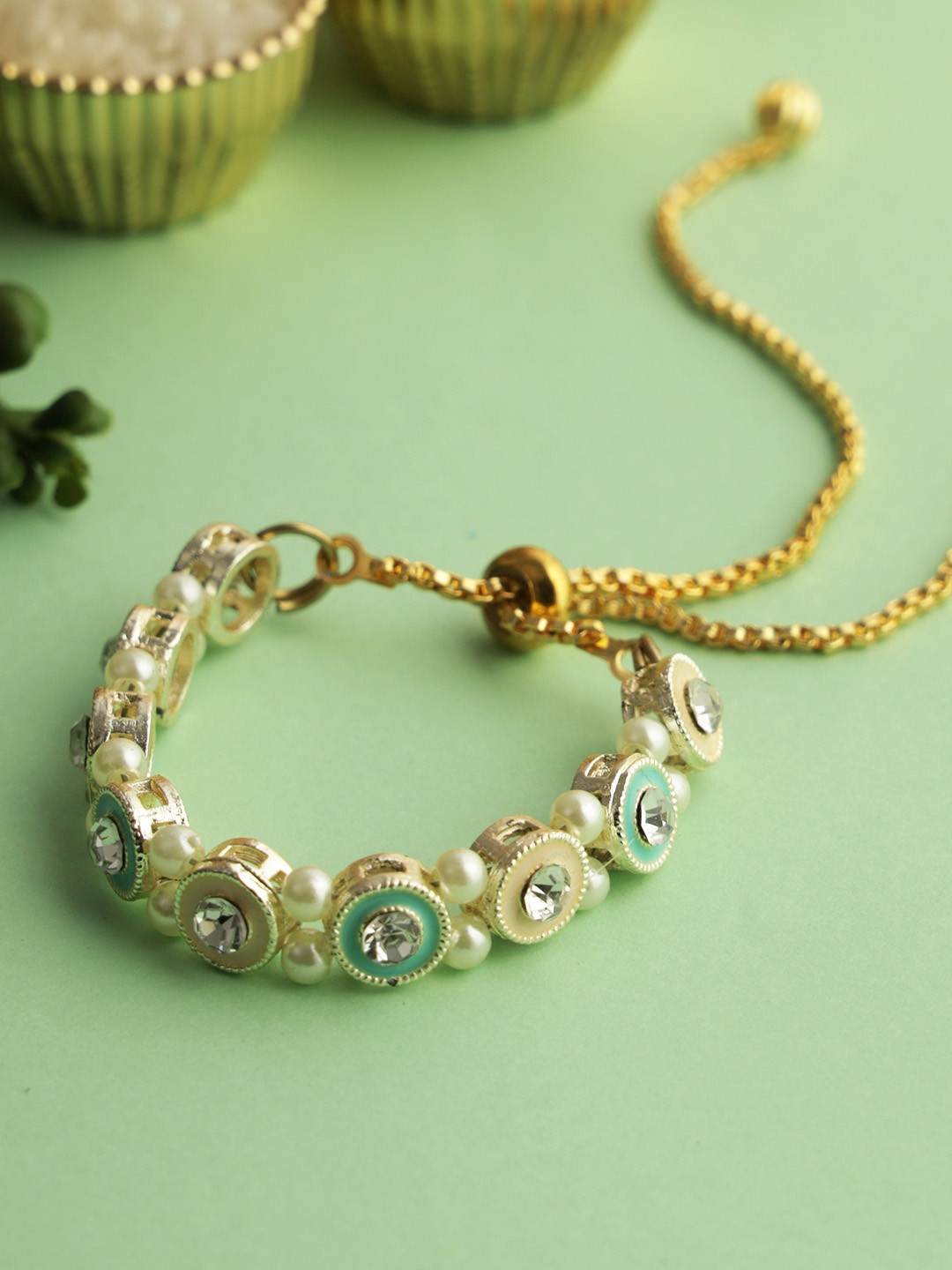 House of Pataudi Stone Studded & Beaded Bracelet Rakhi With Greeting Card & Roli Chawal, Cream
House of Pataudi Stone Studded & Beaded Bracelet Rakhi With Greeting Card & Roli Chawal, Cream