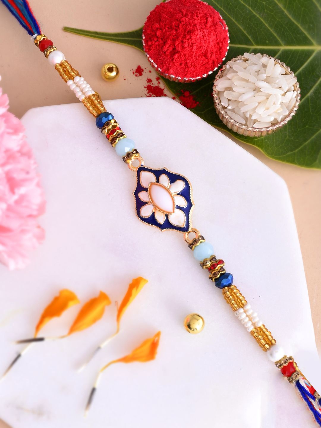 Sangria White & Yellow Floral Enameled Multistrand Rakhi With Roli Chawal & Greetings Card
Sangria White & Yellow Floral Enameled Multistrand Rakhi With Roli Chawal & Greetings Card