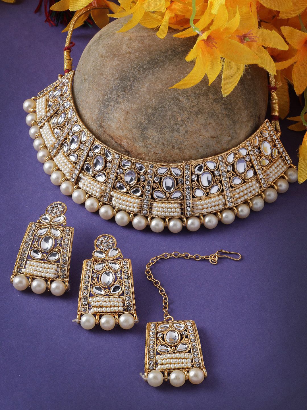 Sukkhi Gold Plated Stone Studded & Pearls Beaded Adorable Unique Stylish Jewellery Set
Sukkhi Gold Plated Stone Studded & Pearls Beaded Adorable Unique Stylish Jewellery Set