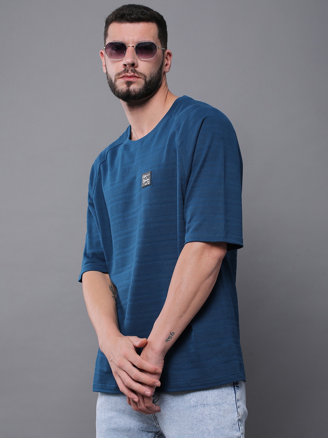 Difference of Opinion Men Solid Popcorn Structure Oversized Raglan T-Shirt, Turquoise blue
Difference of Opinion Men Solid Popcorn Structure Oversized Raglan T-Shirt, Turquoise blue