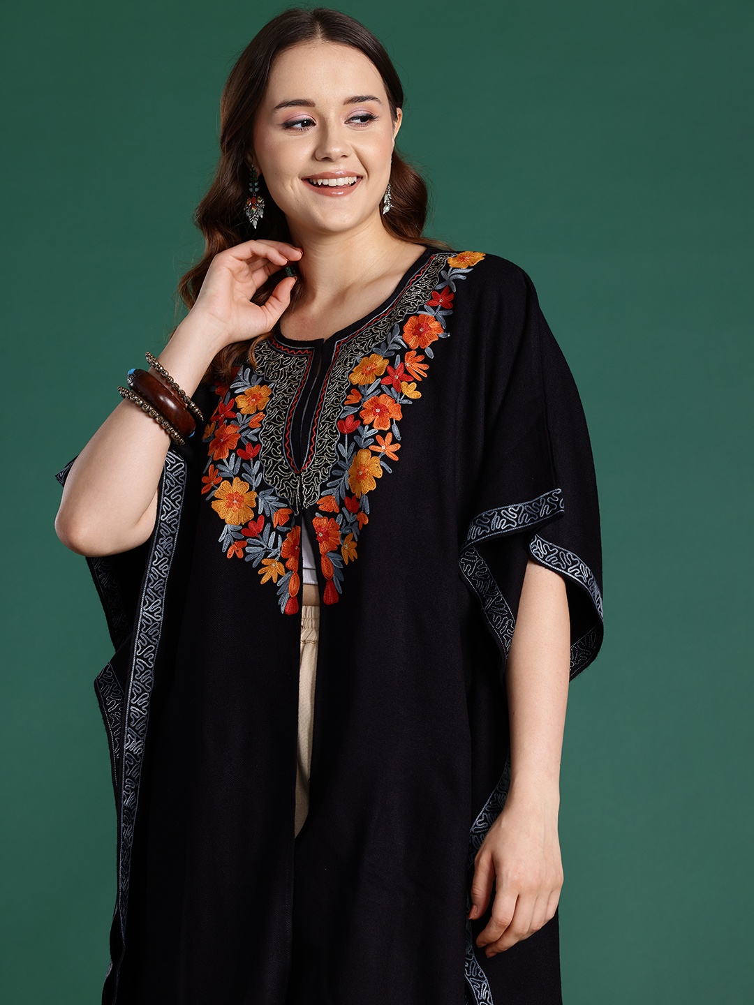 Sangria Floral Embroidered Flared Sleeves Thread Work Jacquard Kaftan Kurta, Black
Sangria Floral Embroidered Flared Sleeves Thread Work Jacquard Kaftan Kurta, Black