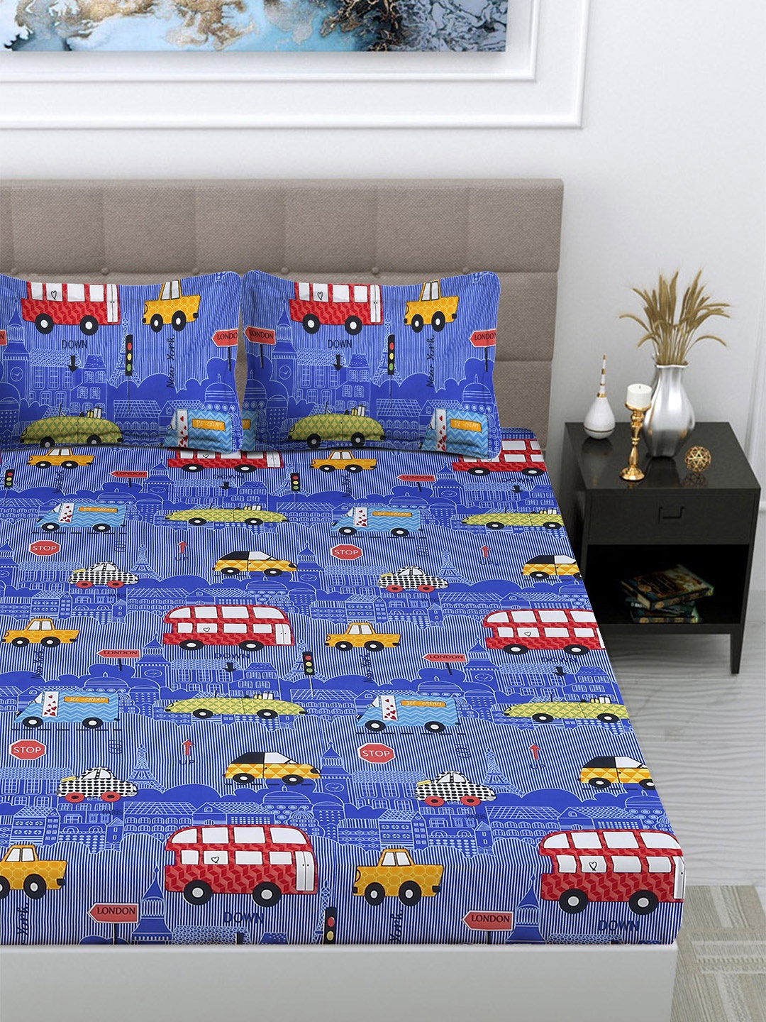 FABINALIV Blue & White Cartoon Printed King Size Double Bedsheet with 2 Pillow Covers
FABINALIV Blue & White Cartoon Printed King Size Double Bedsheet with 2 Pillow Covers