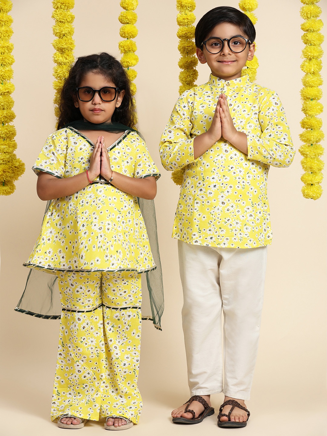 Cutiekins Girls Floral Printed Empire Gotta Patti A-Line Kurti with Sharara & Dupatta, Yellow
Cutiekins Girls Floral Printed Empire Gotta Patti A-Line Kurti with Sharara & Dupatta, Yellow