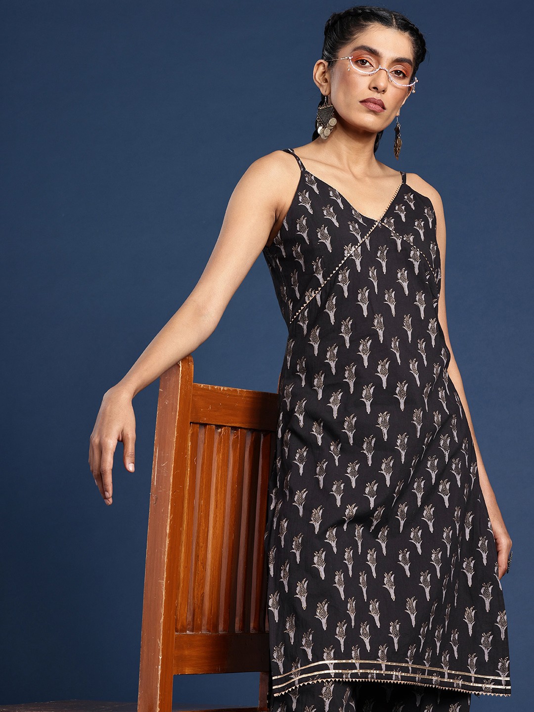 Taavi Ethnic Motifs Printed High Slit Gotta Patti Pure Cotton Kurti with Salwar, Black
Taavi Ethnic Motifs Printed High Slit Gotta Patti Pure Cotton Kurti with Salwar, Black