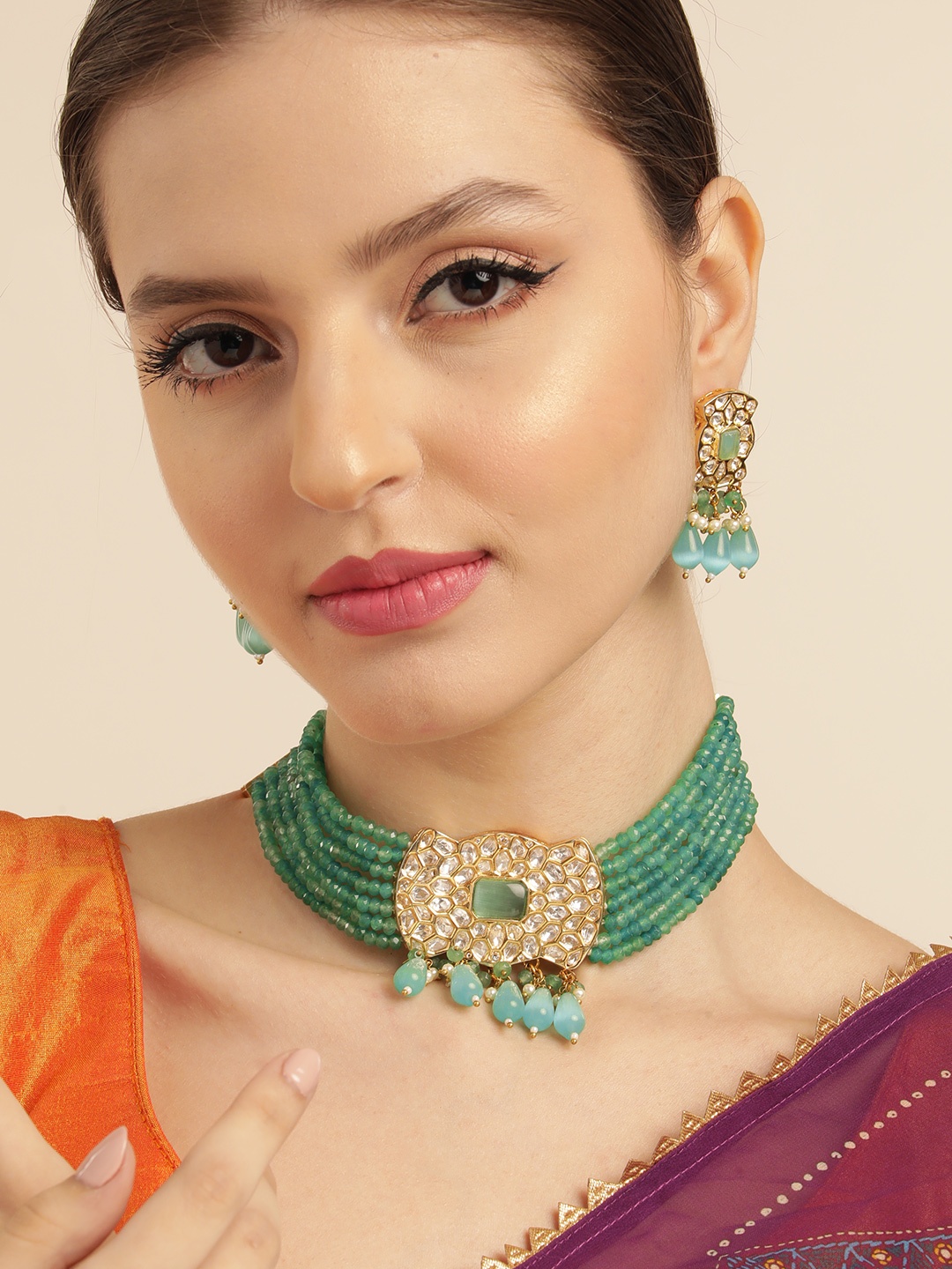 House of Pataudi Kundan Mint Layered Premium Golden Pendent Chokar Necklace Set, Green
House of Pataudi Kundan Mint Layered Premium Golden Pendent Chokar Necklace Set, Green