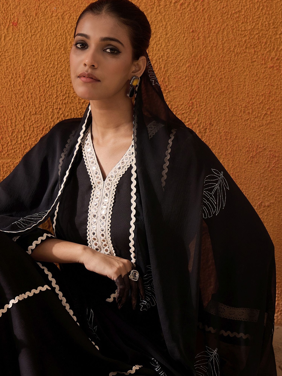 Indo Era Women Embroidered Regular Mirror Work Kurta with Trousers & With Dupatta, Black
Indo Era Women Embroidered Regular Mirror Work Kurta with Trousers & With Dupatta, Black