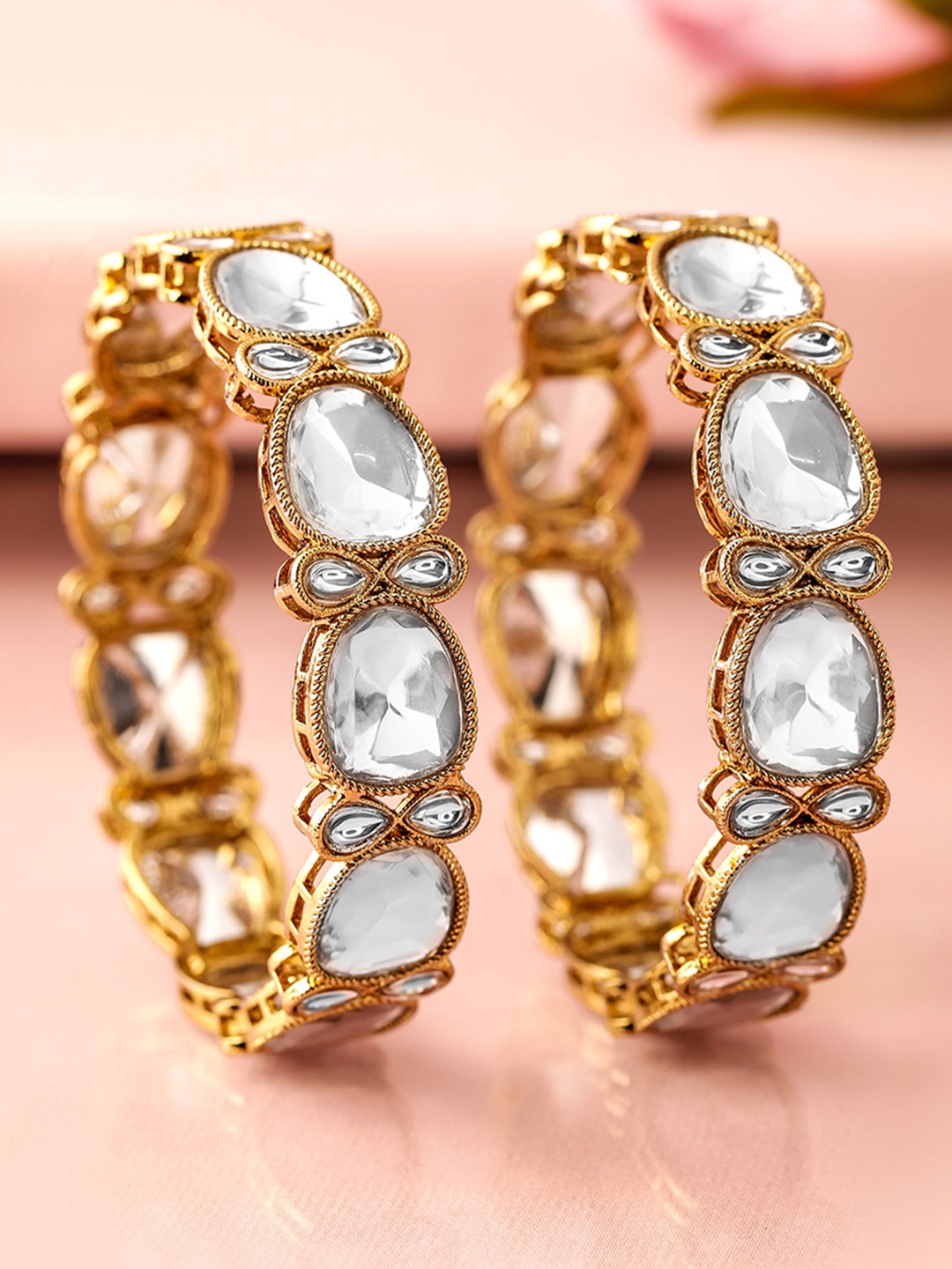 Rubans Set of 2 18K Mehandi Gold-Plated Crystal White CubicZirconia Studded Premium Bangle
Rubans Set of 2 18K Mehandi Gold-Plated Crystal White CubicZirconia Studded Premium Bangle