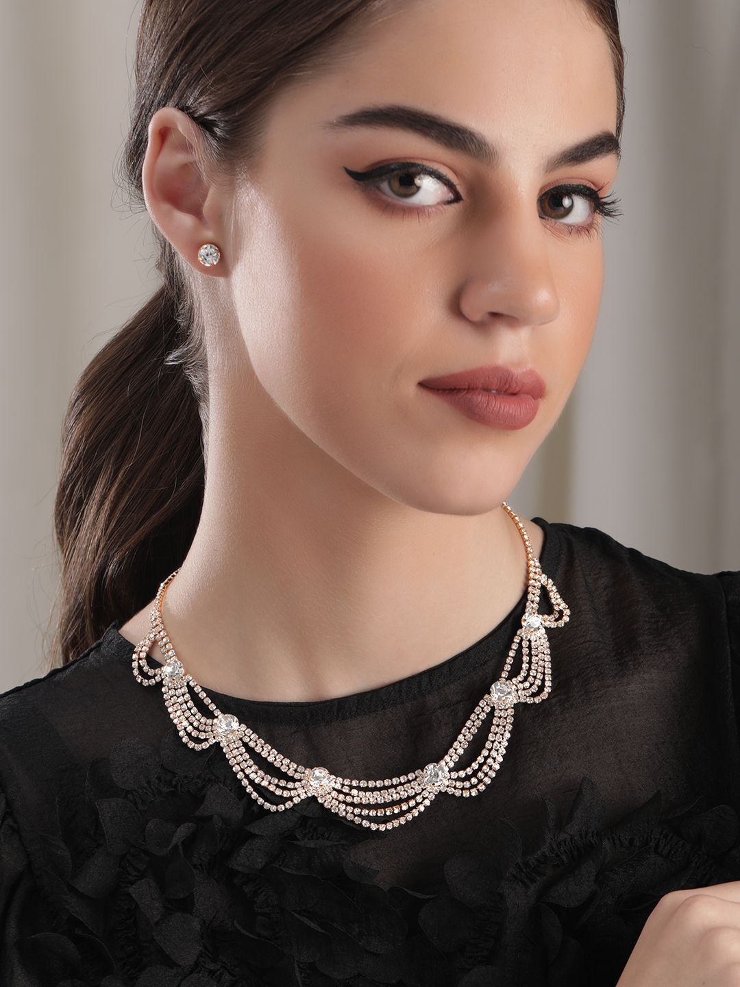 Rubans 22K Gold Plated Cubic Zirconia Studded Multi-Layer Statement Necklace Set
Rubans 22K Gold Plated Cubic Zirconia Studded Multi-Layer Statement Necklace Set