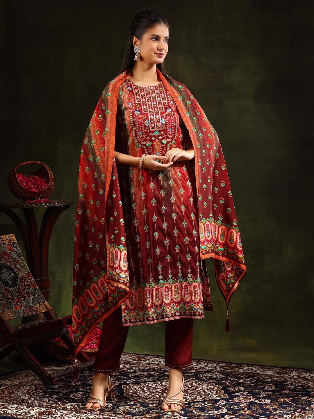 KALINI Women Floral Embroidered Regular Pure Silk Kurta with Trousers & With Dupatta, Rust
KALINI Women Floral Embroidered Regular Pure Silk Kurta with Trousers & With Dupatta, Rust