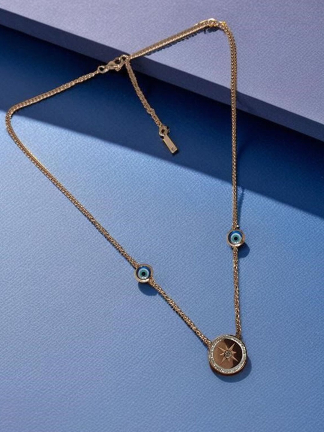 MANSIYAORANGE Stainless Steel Gold Plated Stone Studded Circular Pendant With Chain
MANSIYAORANGE Stainless Steel Gold Plated Stone Studded Circular Pendant With Chain