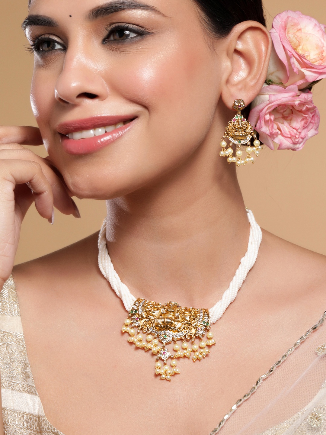 Rubans 22K Gold-Plated Divine Lakshmi Motif Necklace Set with White Beads & Pearl Drops
Rubans 22K Gold-Plated Divine Lakshmi Motif Necklace Set with White Beads & Pearl Drops