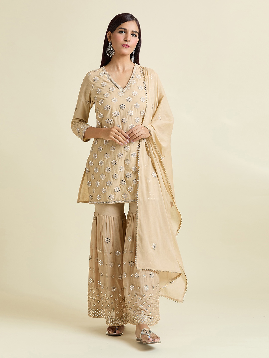 Adara Khan Embroidered Thread Work Pure Cotton Straight Kurti with Sharara & Dupatta, Beige
Adara Khan Embroidered Thread Work Pure Cotton Straight Kurti with Sharara & Dupatta, Beige