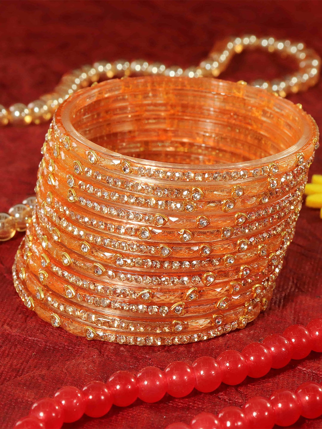 LAVAZZA Set Of 12 Zircon Diamond Stone Crystals Studded & Beads Glass Bangles, Peach
LAVAZZA Set Of 12 Zircon Diamond Stone Crystals Studded & Beads Glass Bangles, Peach