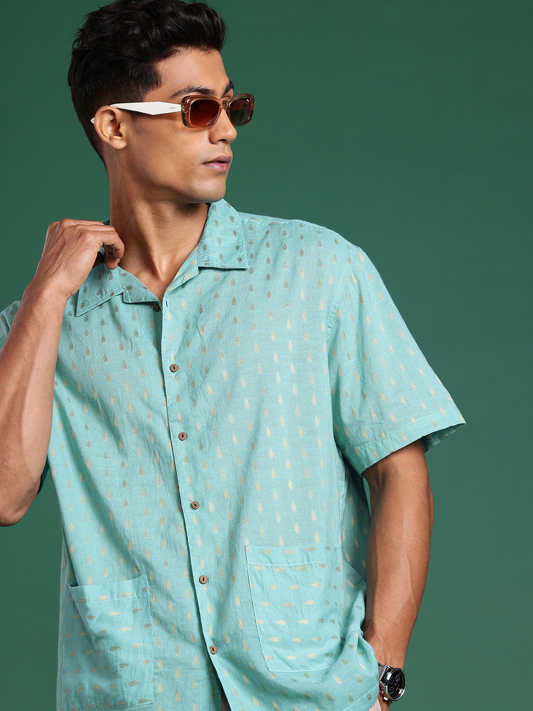 Sangria Boxy Ethnic Motifs Woven Design Drop-Shoulder Sleeves Pure Cotton Casual Shirt, Turquoise blue
Sangria Boxy Ethnic Motifs Woven Design Drop-Shoulder Sleeves Pure Cotton Casual Shirt, Turquoise blue