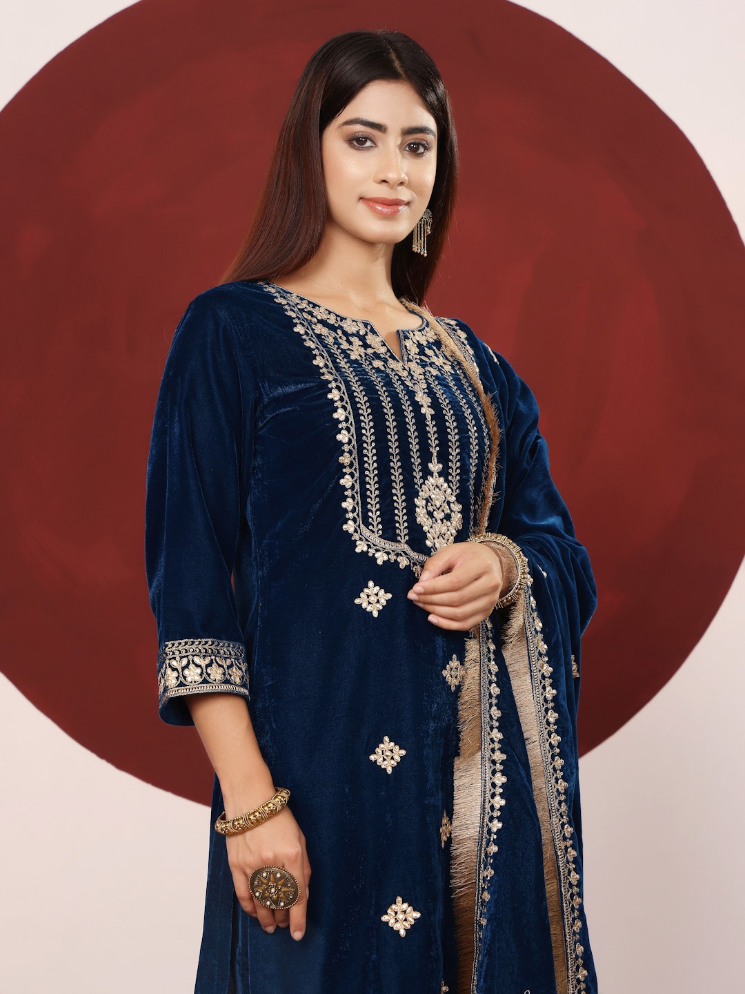 Varanga Teal Blue Floral Embroidered V-Neck Velvet Straight Kurta with Trousers & Dupatta
Varanga Teal Blue Floral Embroidered V-Neck Velvet Straight Kurta with Trousers & Dupatta