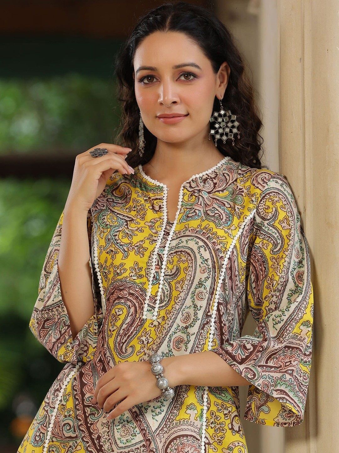 Shrivani Paisley Printed Notch Neck Flared Sleeves Gotta Patti Straight Cotton Kurta, Yellow
Shrivani Paisley Printed Notch Neck Flared Sleeves Gotta Patti Straight Cotton Kurta, Yellow
