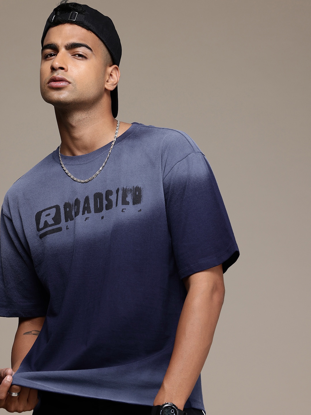The Roadster Life Co. Brand Logo Printed Drop-Shoulder Sleeves Pure Cotton Relaxed T-shirt, Blue
The Roadster Life Co. Brand Logo Printed Drop-Shoulder Sleeves Pure Cotton Relaxed T-shirt, Blue