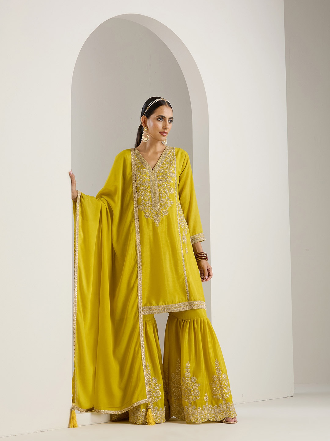 Ishin Mustard Yellow Ethnic Motifs Embroidered Straight Kurta With Sharara & Dupatta
Ishin Mustard Yellow Ethnic Motifs Embroidered Straight Kurta With Sharara & Dupatta