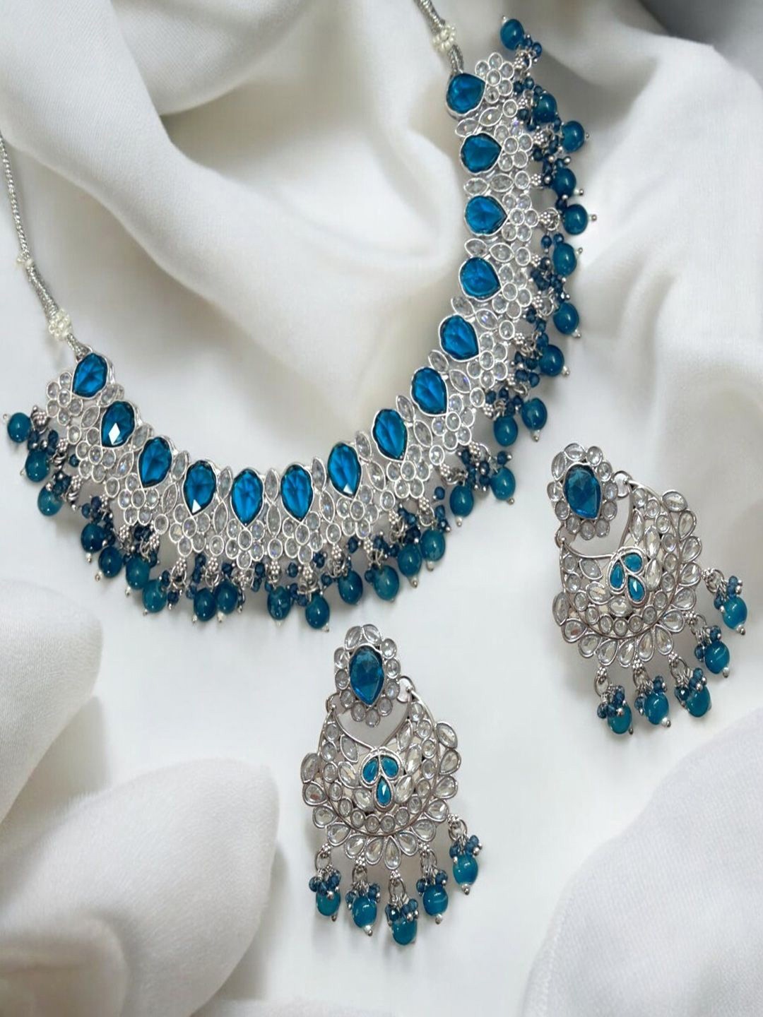 AccessHer Sterling Silver-Plated AD Studded & Beaded Necklace and Earrings With Maang Tika
AccessHer Sterling Silver-Plated AD Studded & Beaded Necklace and Earrings With Maang Tika